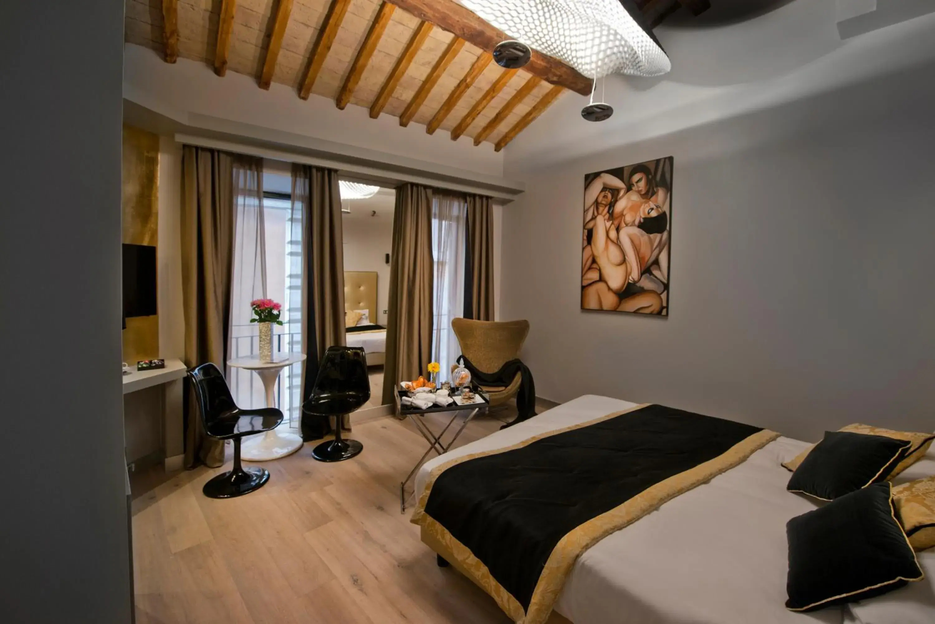 Photo of the whole room in Torre Argentina Relais - Residenze di Charme