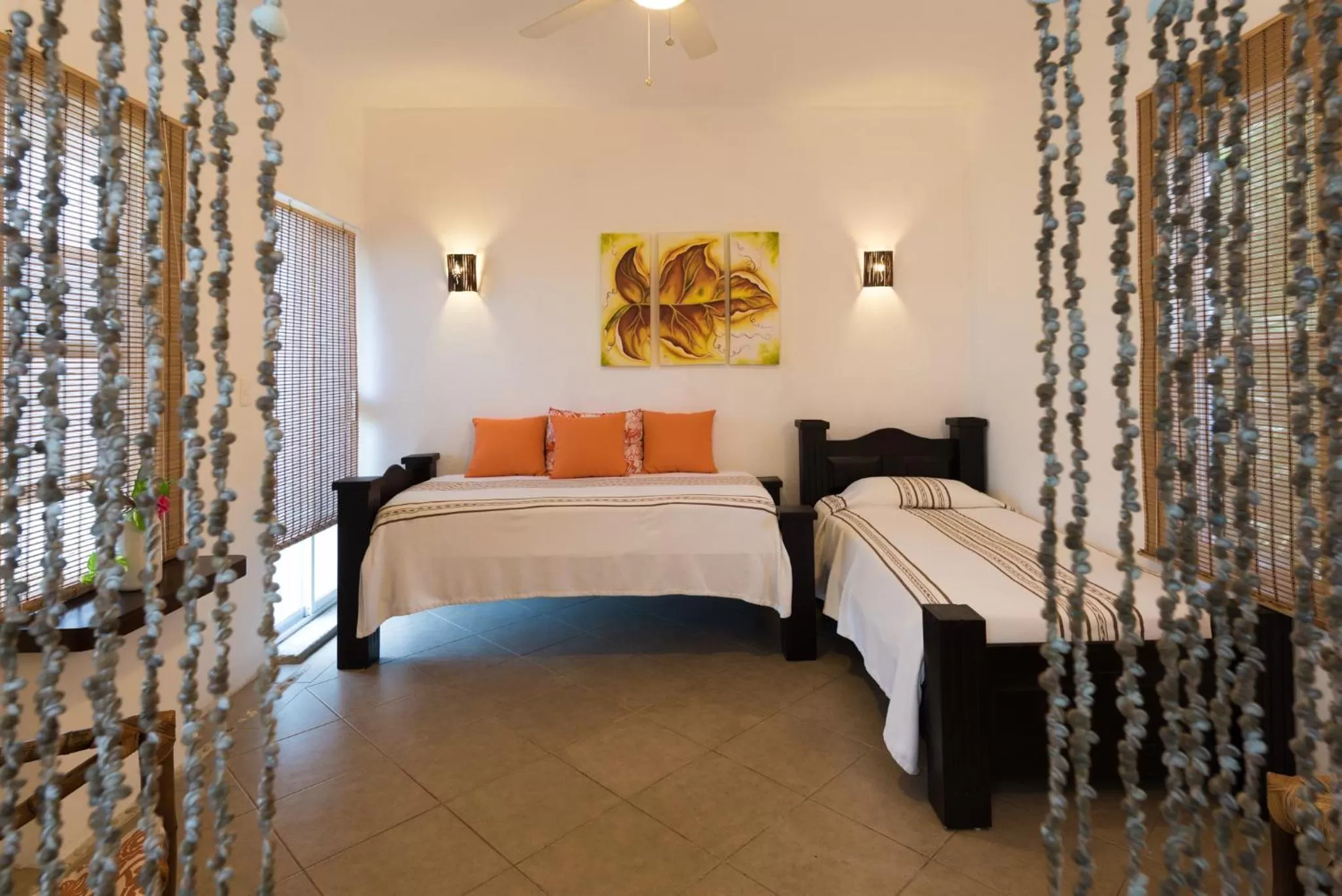 Living room, Bed in Villas El Encanto Cozumel