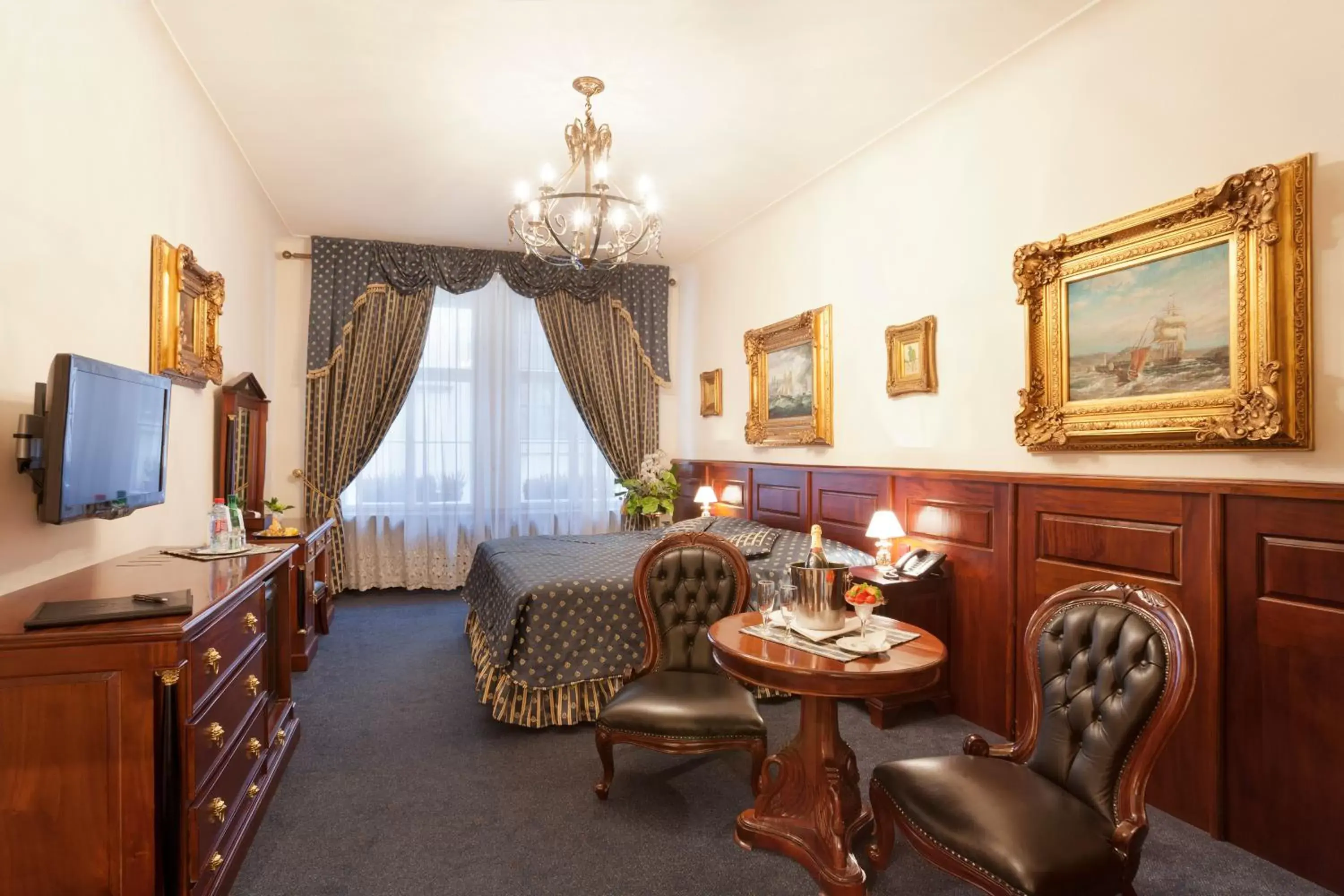 Bedroom, Seating Area in Hotel U Zlatého Stromu Prague by BHG