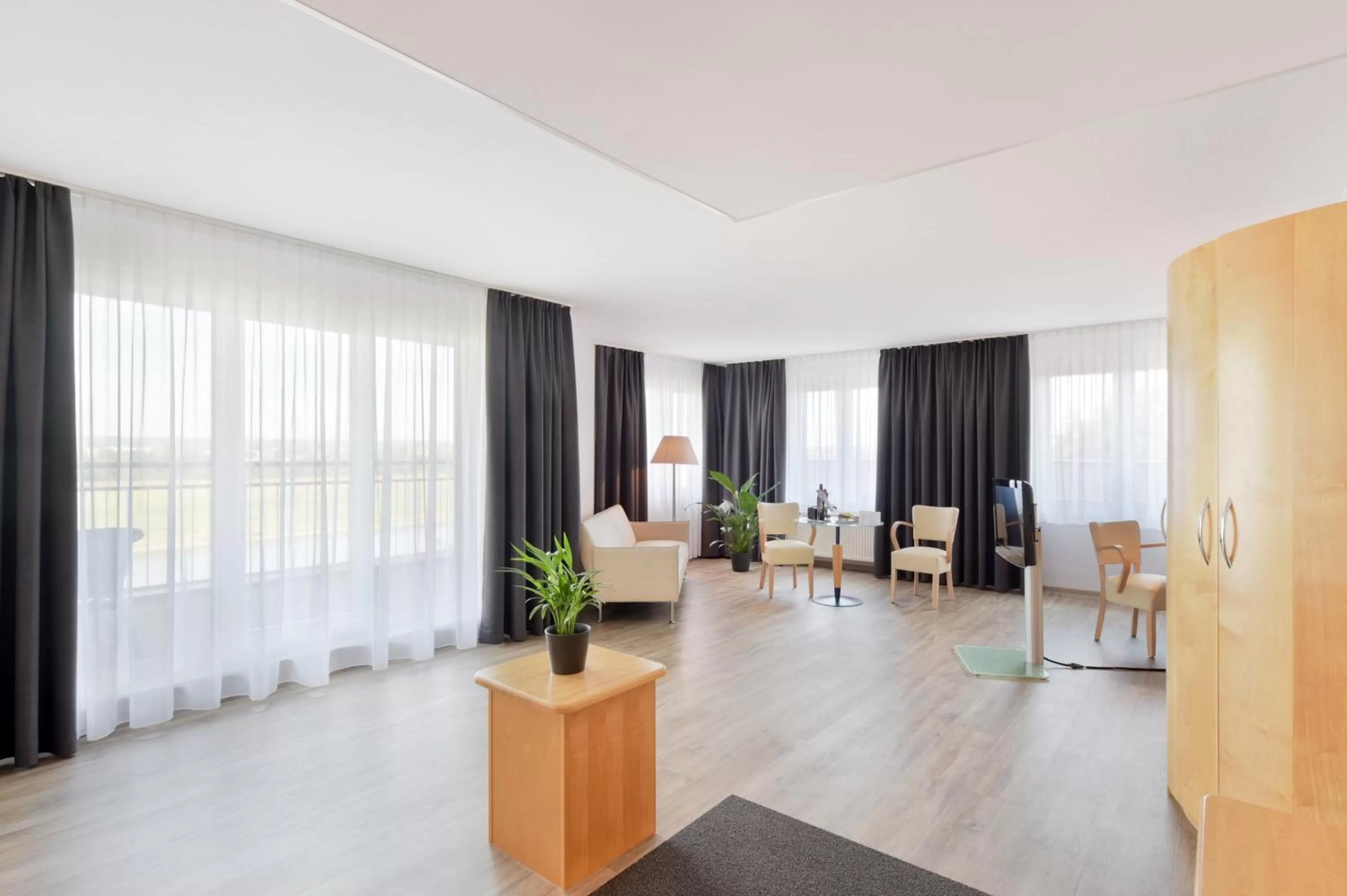 Living room in Amedia Dresden Elbpromenade, Trademark Collection by Wyndham