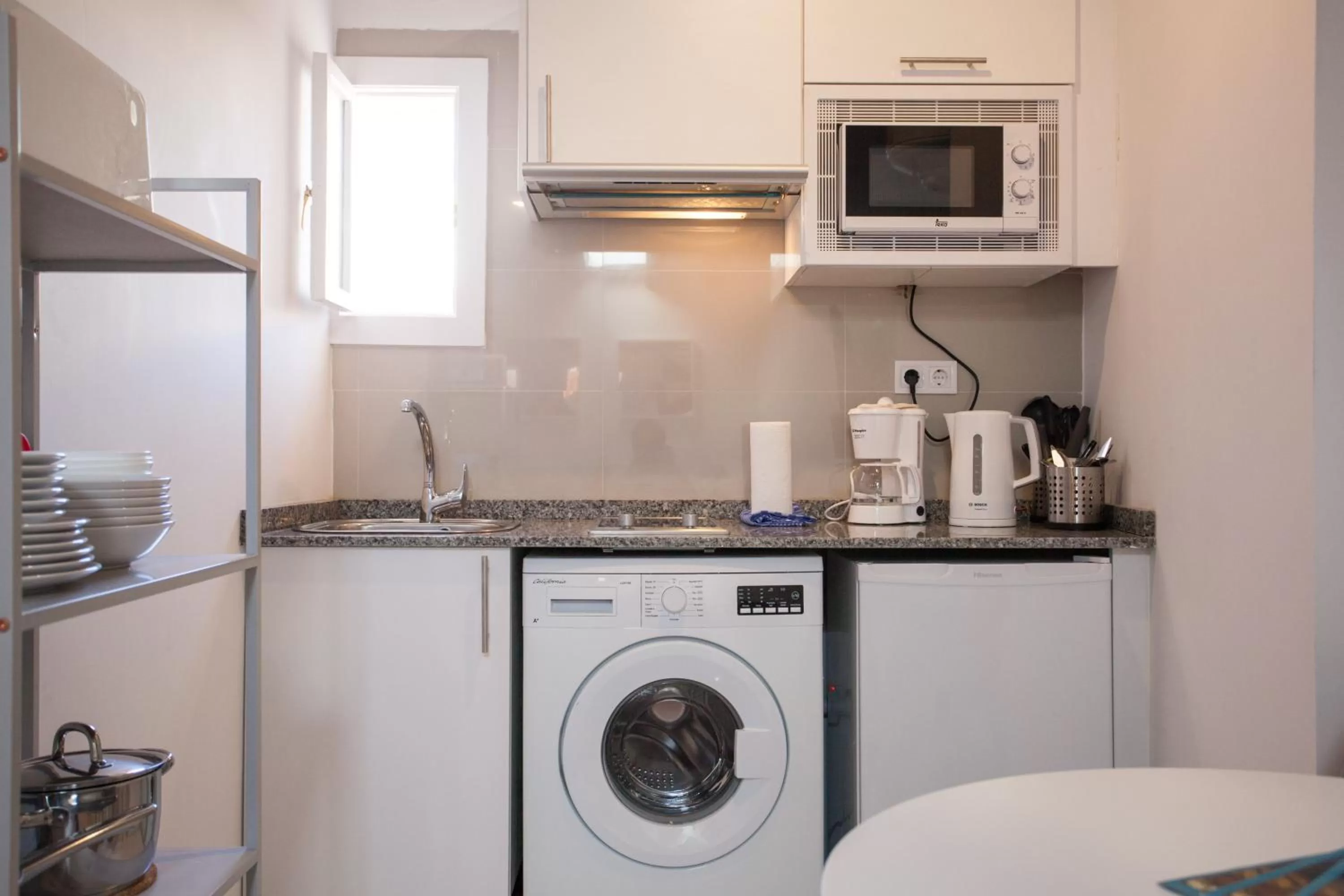 Kitchen or kitchenette in Gran Central Suites