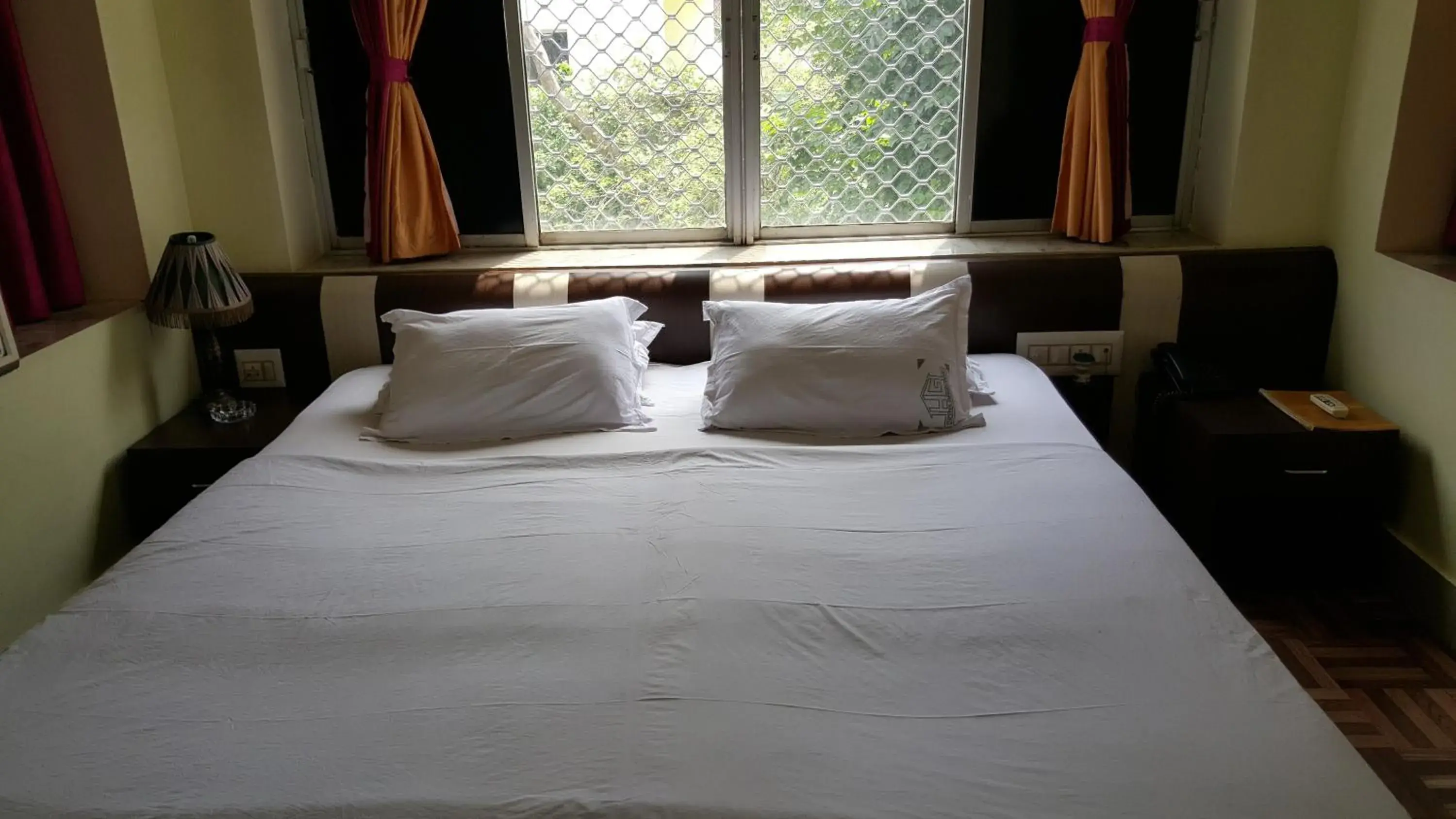 Bed in Gandhara Hotel