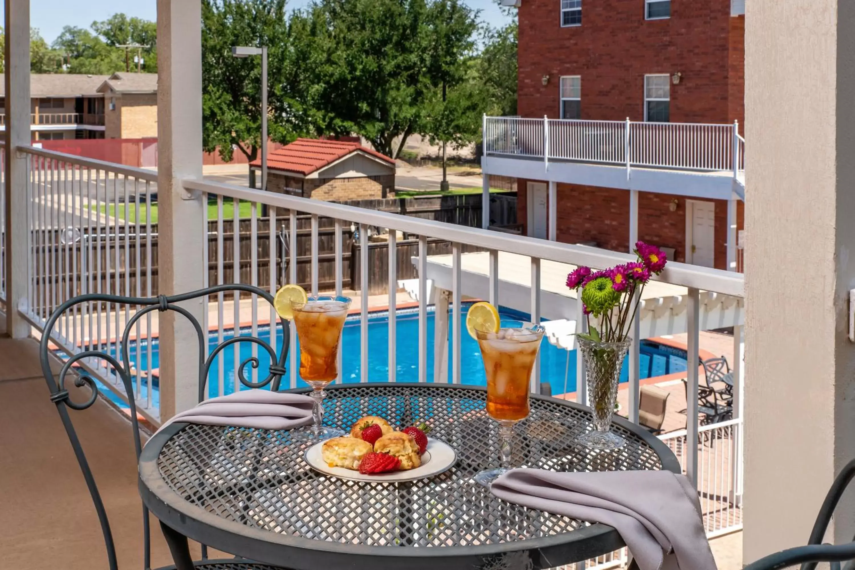 Balcony/Terrace, Pool View in Woodrow House Bed & Breakfast