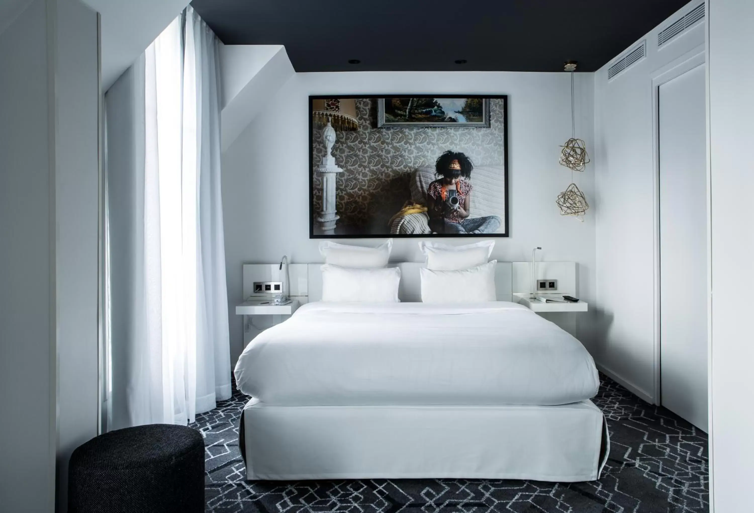 Bed in Le Général Hôtel