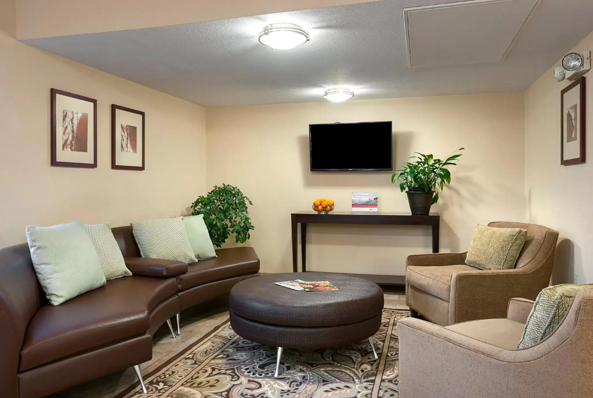 Property building, Seating Area in Candlewood Suites Savannah Airport, an IHG Hotel
