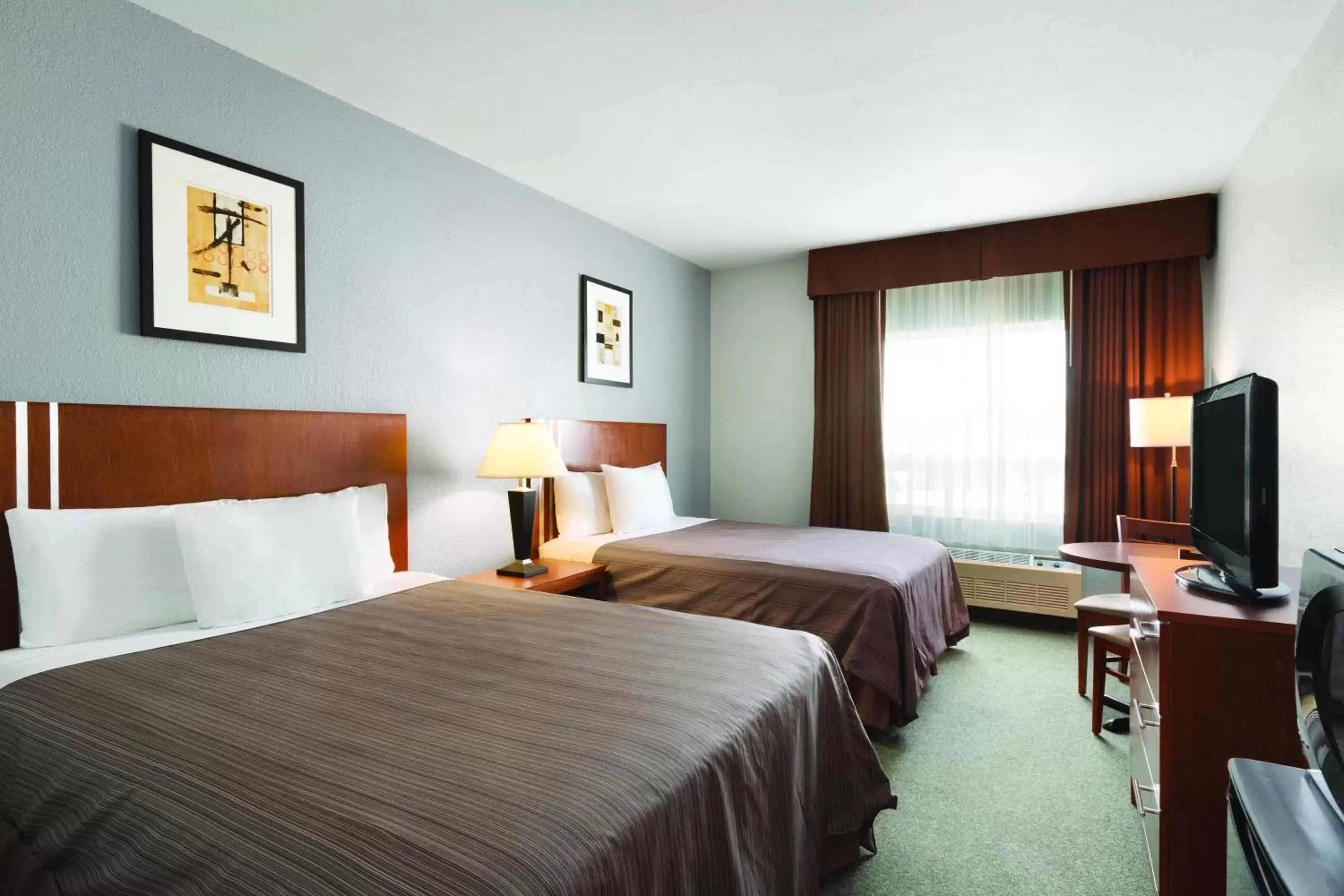 Photo of the whole room, Bed in Days Inn by Wyndham High Prairie