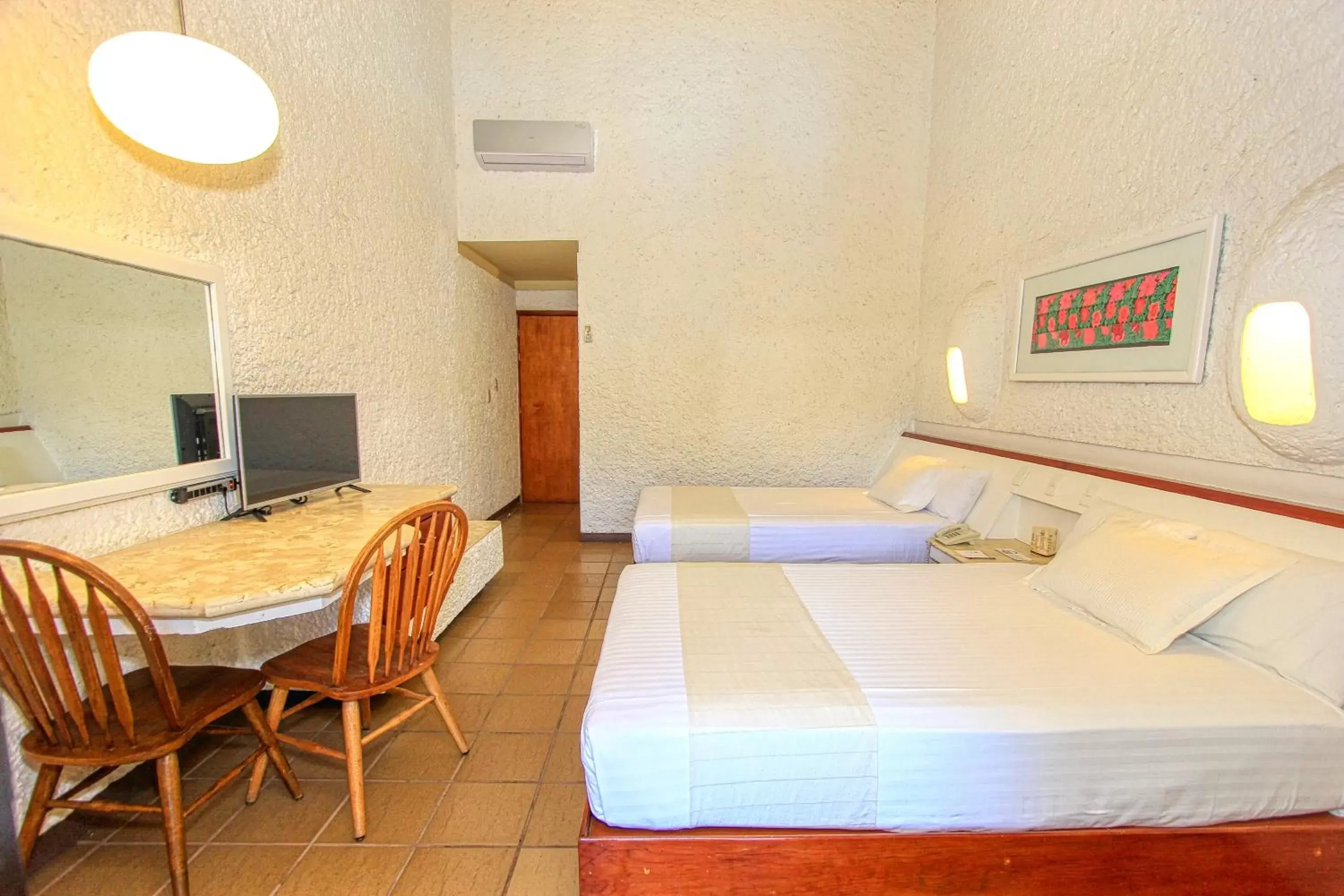 Bed in Hotel Ciudad Real Palenque