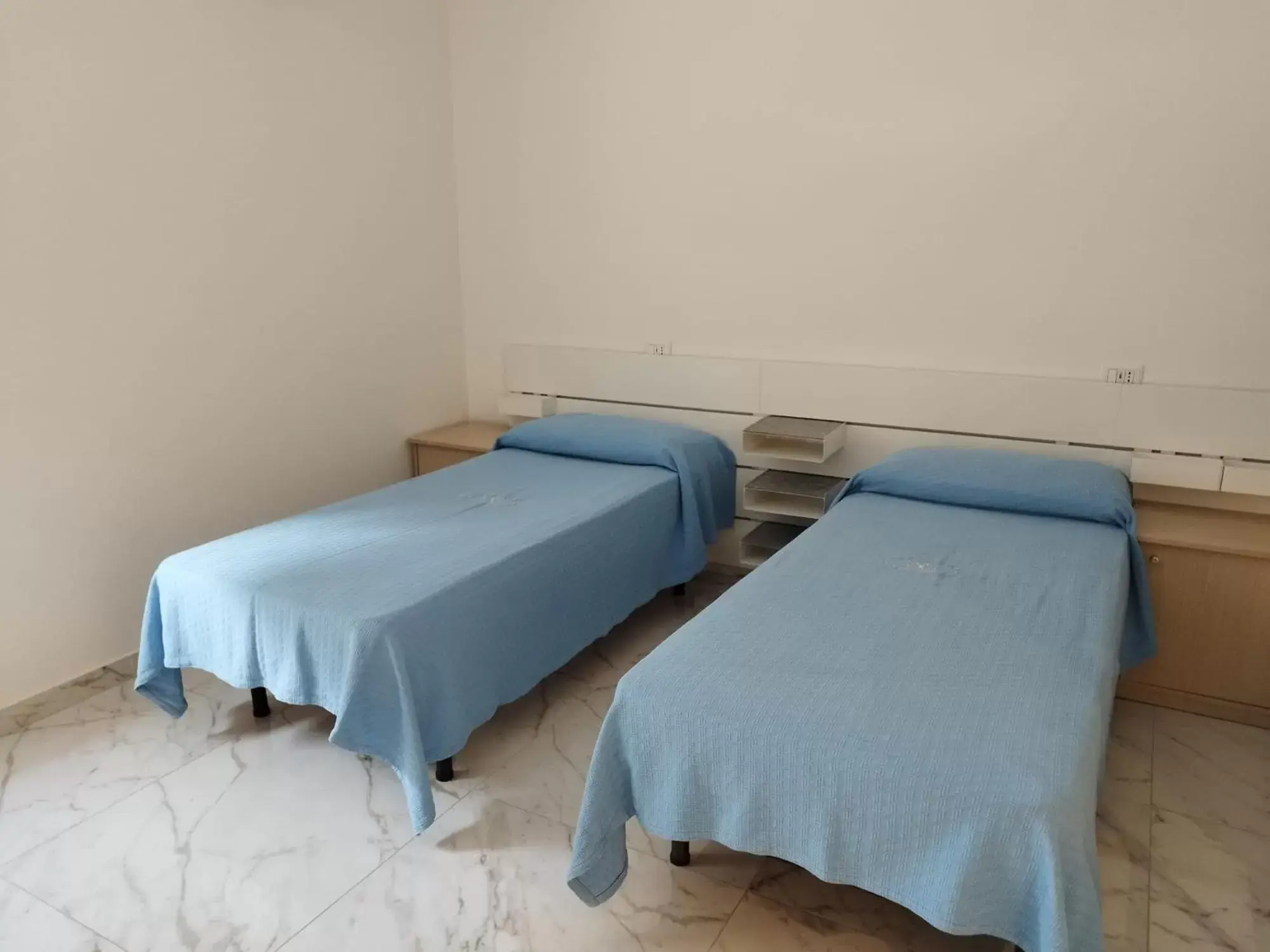 Bed in ROOMS alCentro Bed in ROOMS alCentro