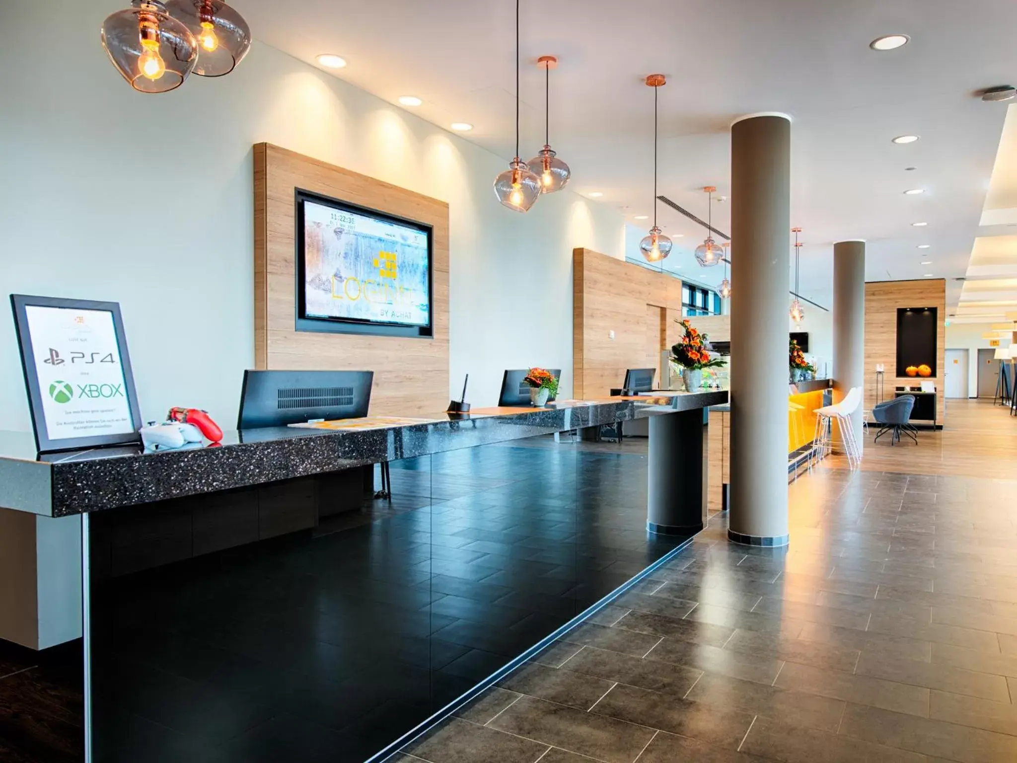 Lobby or reception in LOGINN Hotel Leipzig by ACHAT