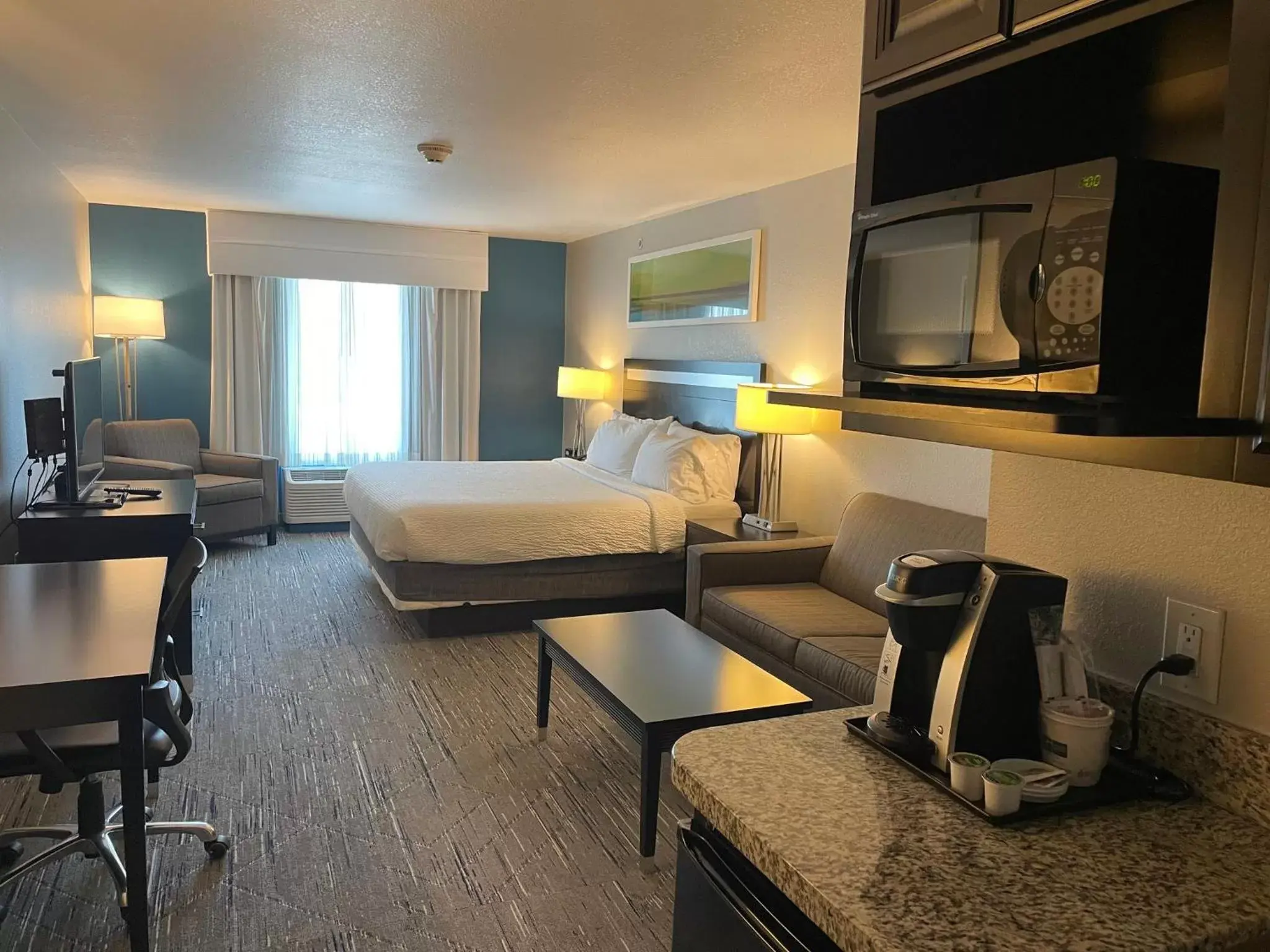 Bedroom in Holiday Inn Express and Suites Montgomery, an IHG Hotel
