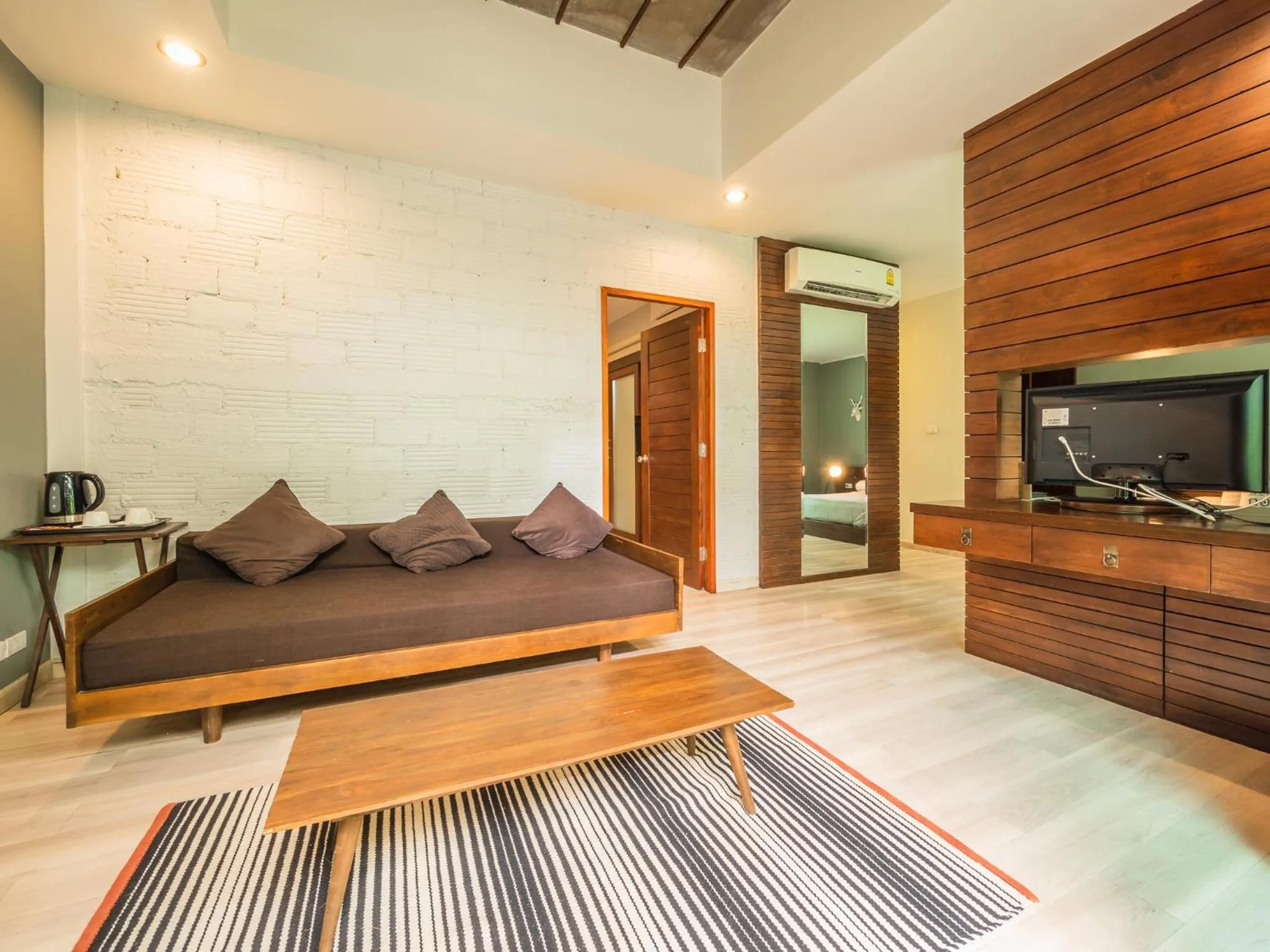 Seating area, Bed in Gord ChiangMai Hotel