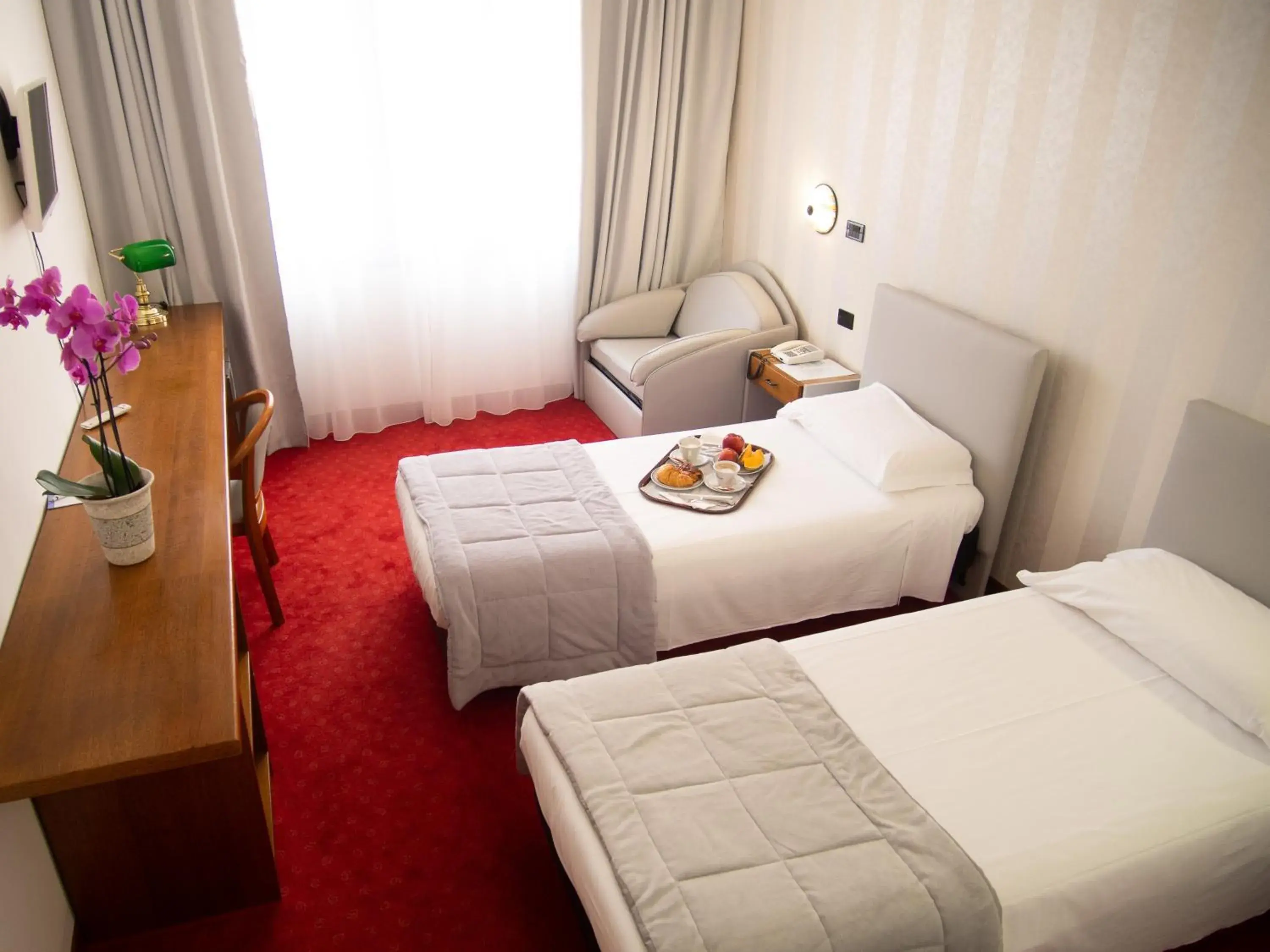 Bed in Hotel Tessarin