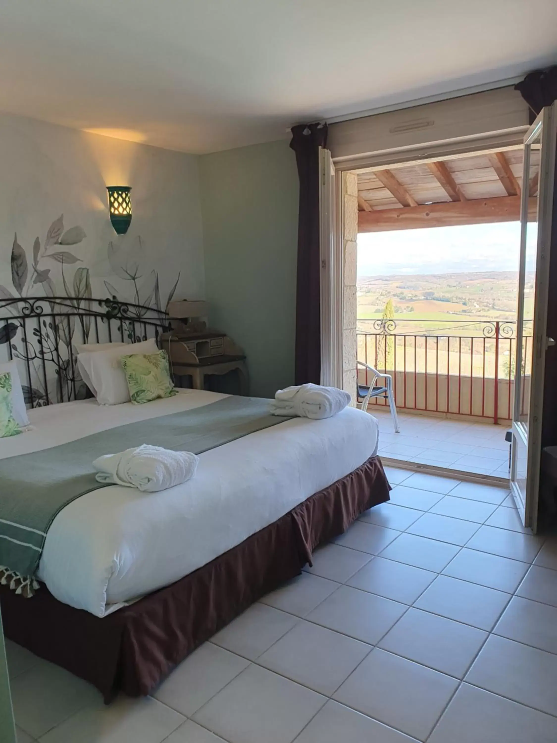 Bedroom, Bed in Le Belvédère Hotel et Bien être