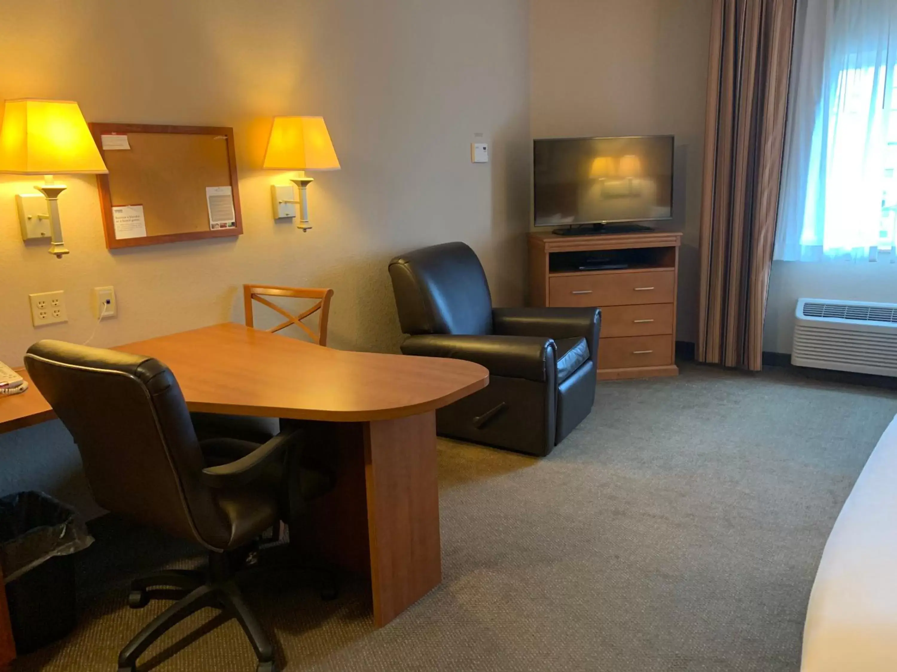 Photo of the whole room, TV/Entertainment Center in Candlewood Suites Jonesboro, an IHG Hotel