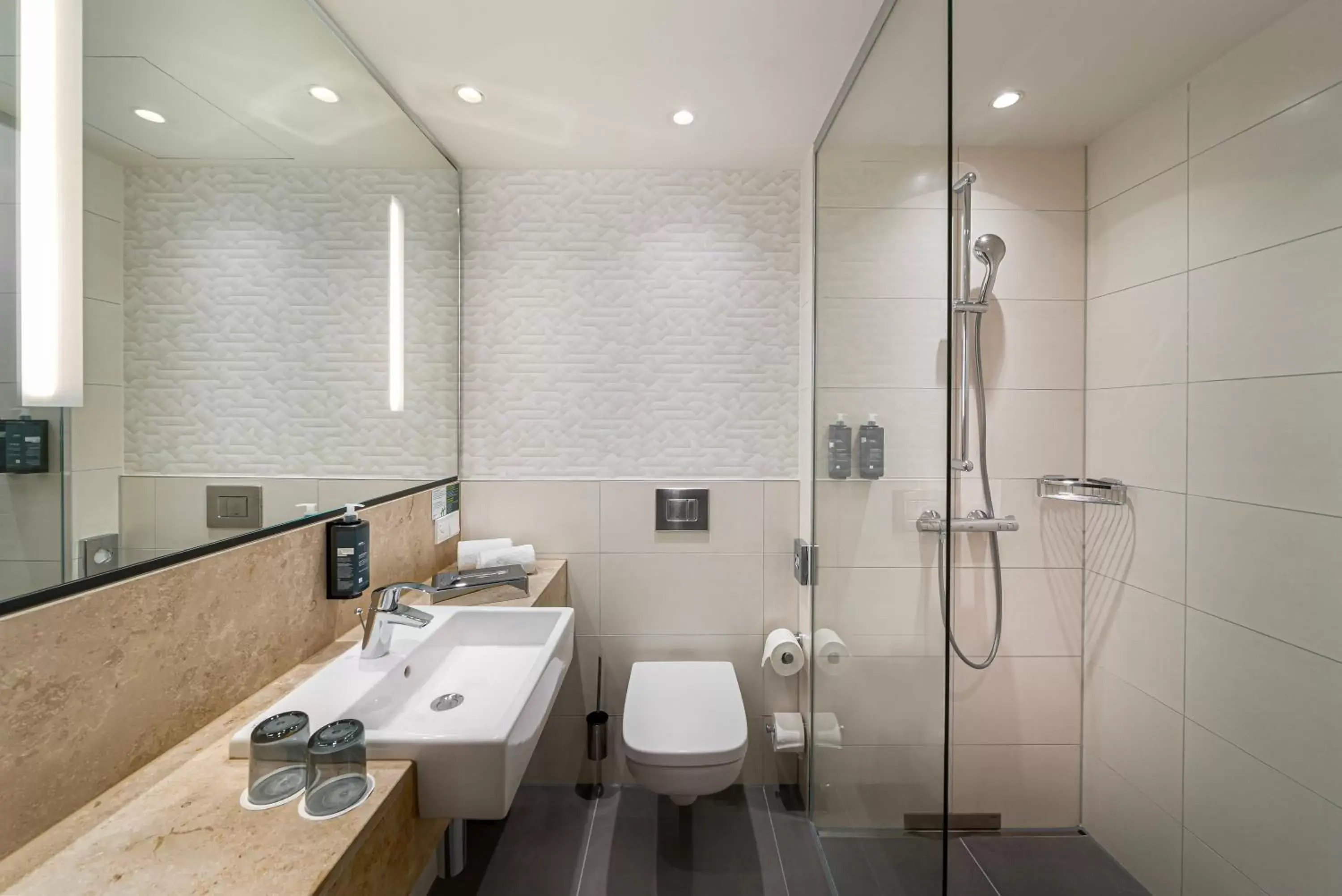 Shower, Bathroom in Holiday Inn - Mannheim City - Hauptbahnhof, an IHG Hotel