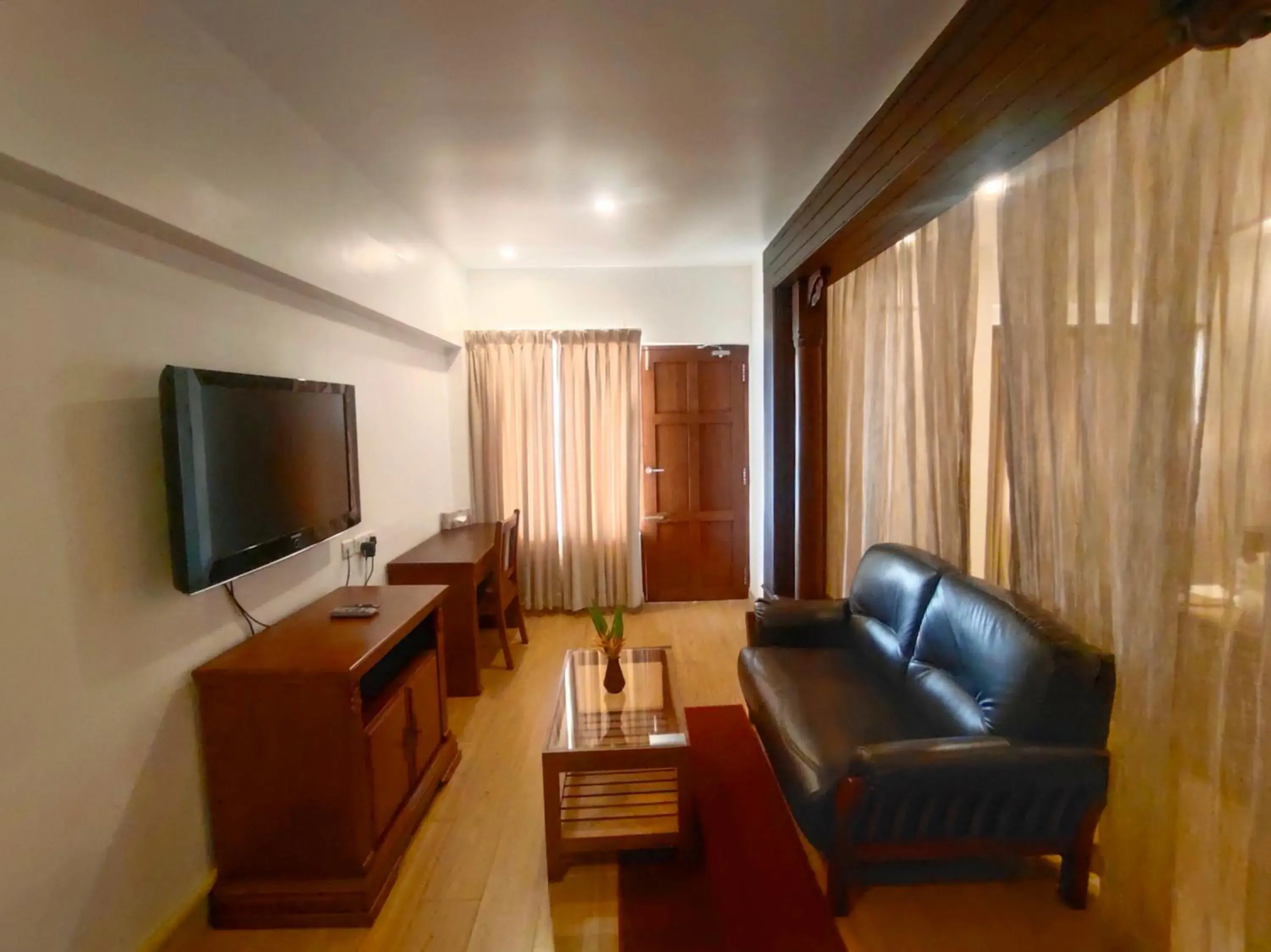 Living room, TV/Entertainment Center in The Travancore Heritage Beach Resort