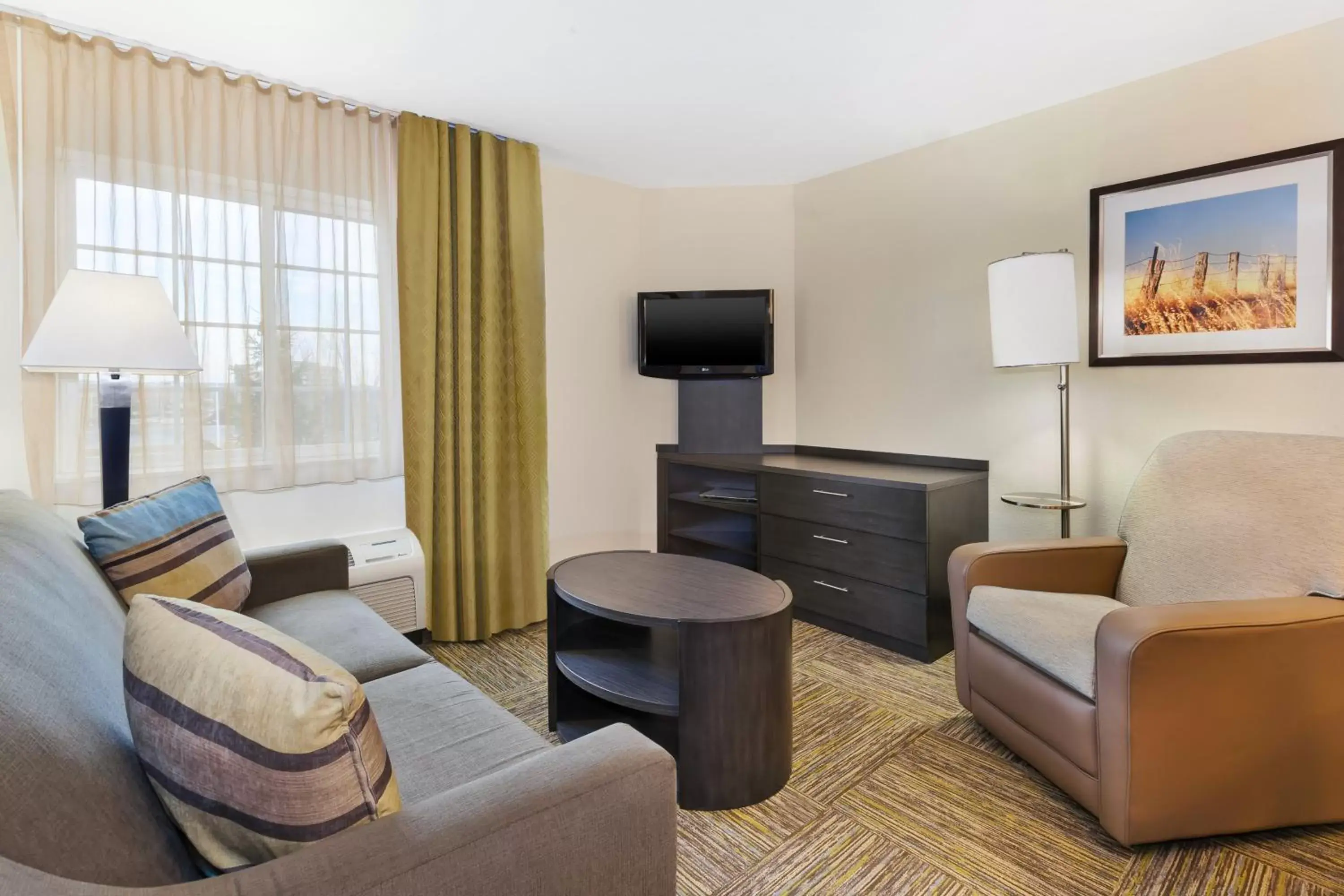 Bedroom, Seating Area in Candlewood Suites Polaris, an IHG Hotel