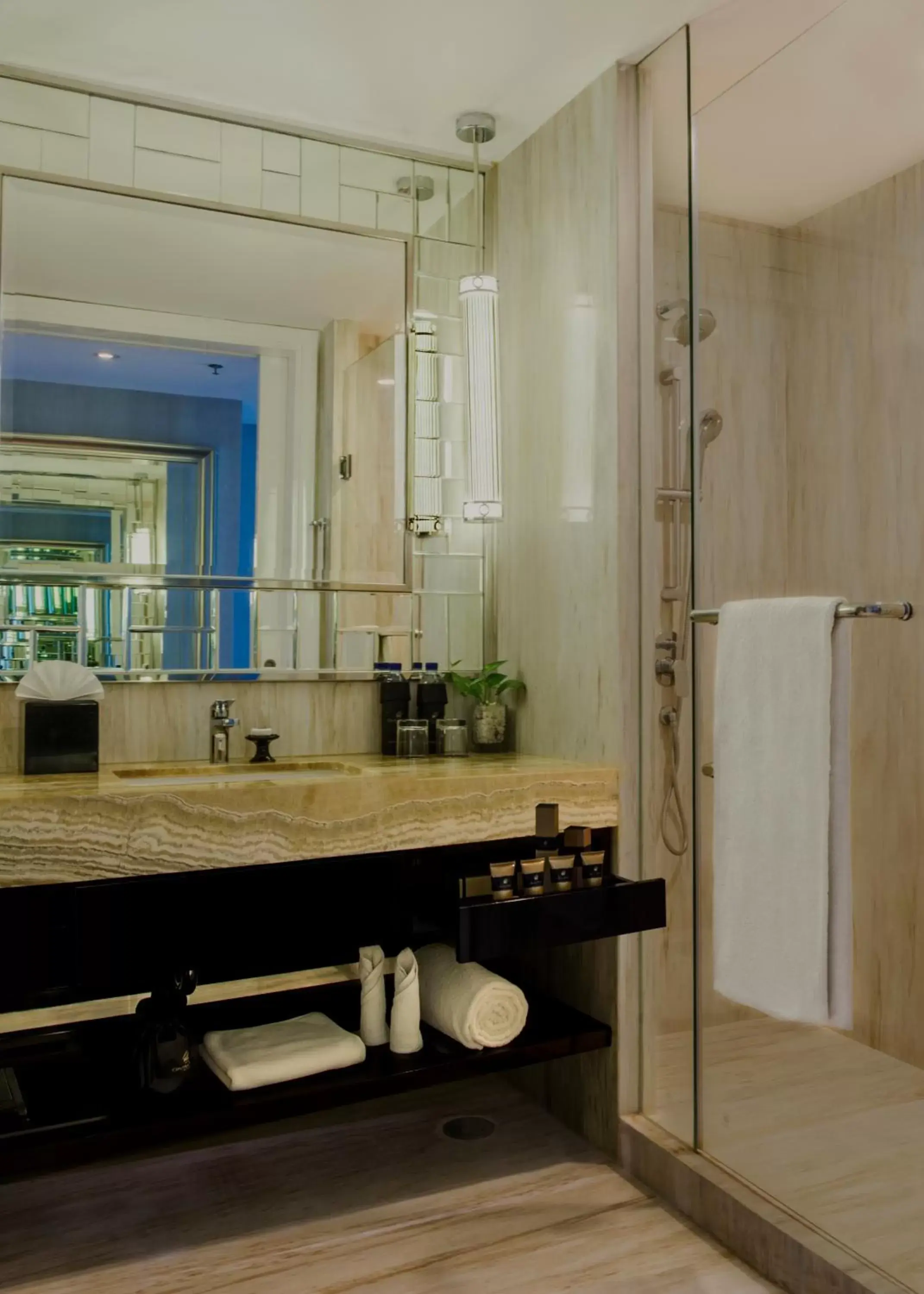 Bathroom in Hotel Ciputra World Surabaya managed by Swiss-Belhotel International