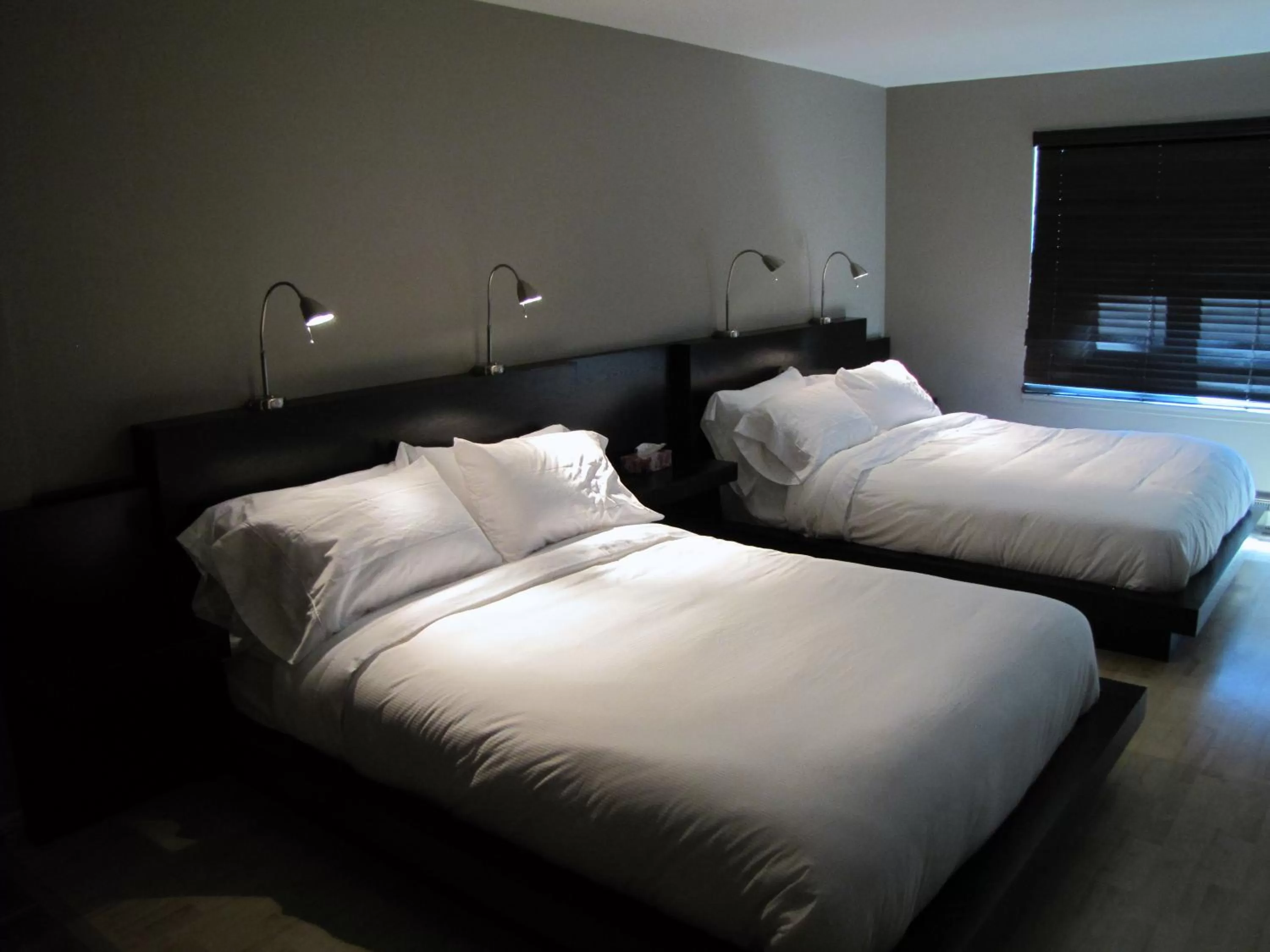 Bed in Hôtel Saint-Germain Rimouski