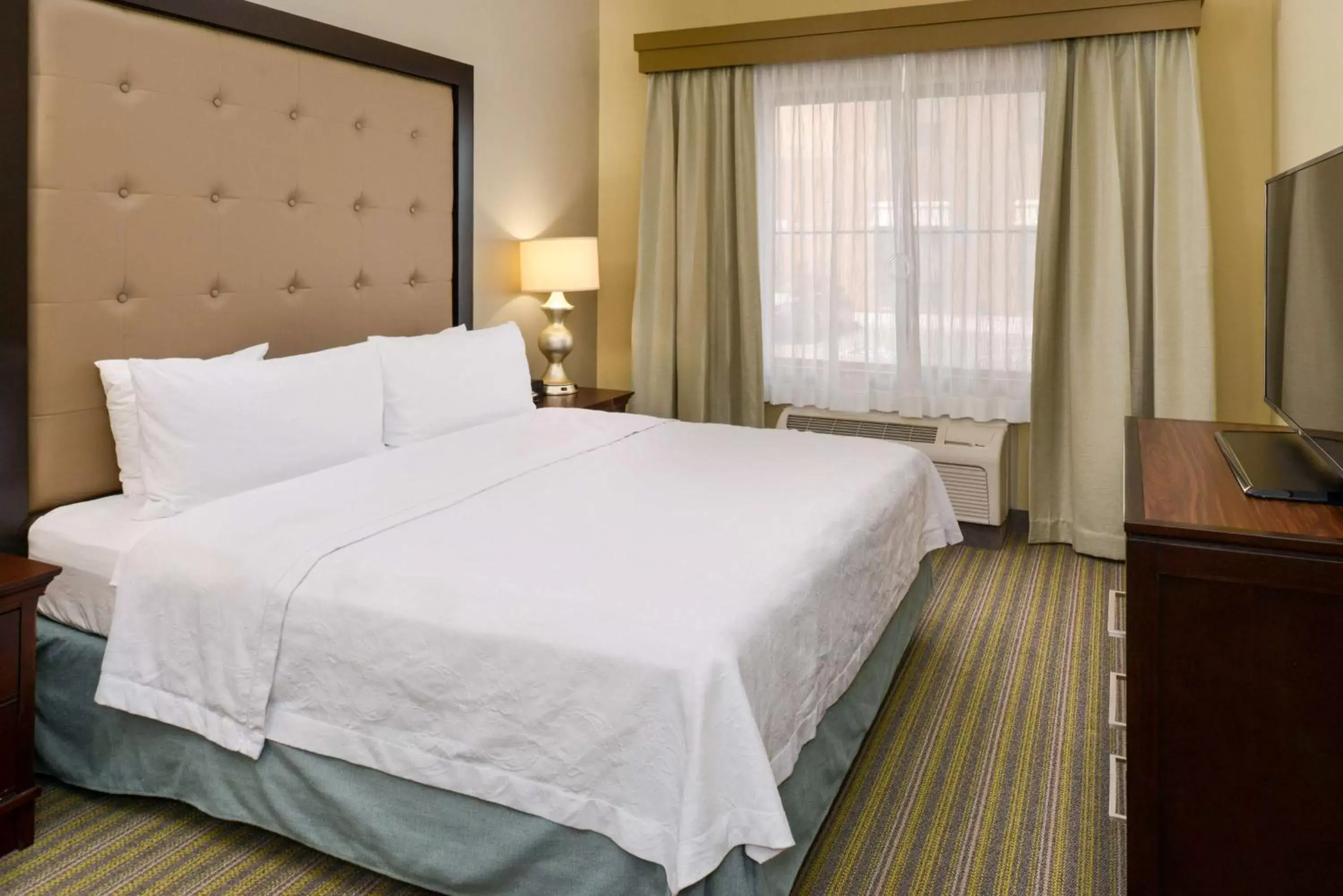 Bed in Homewood Suites by Hilton Fresno