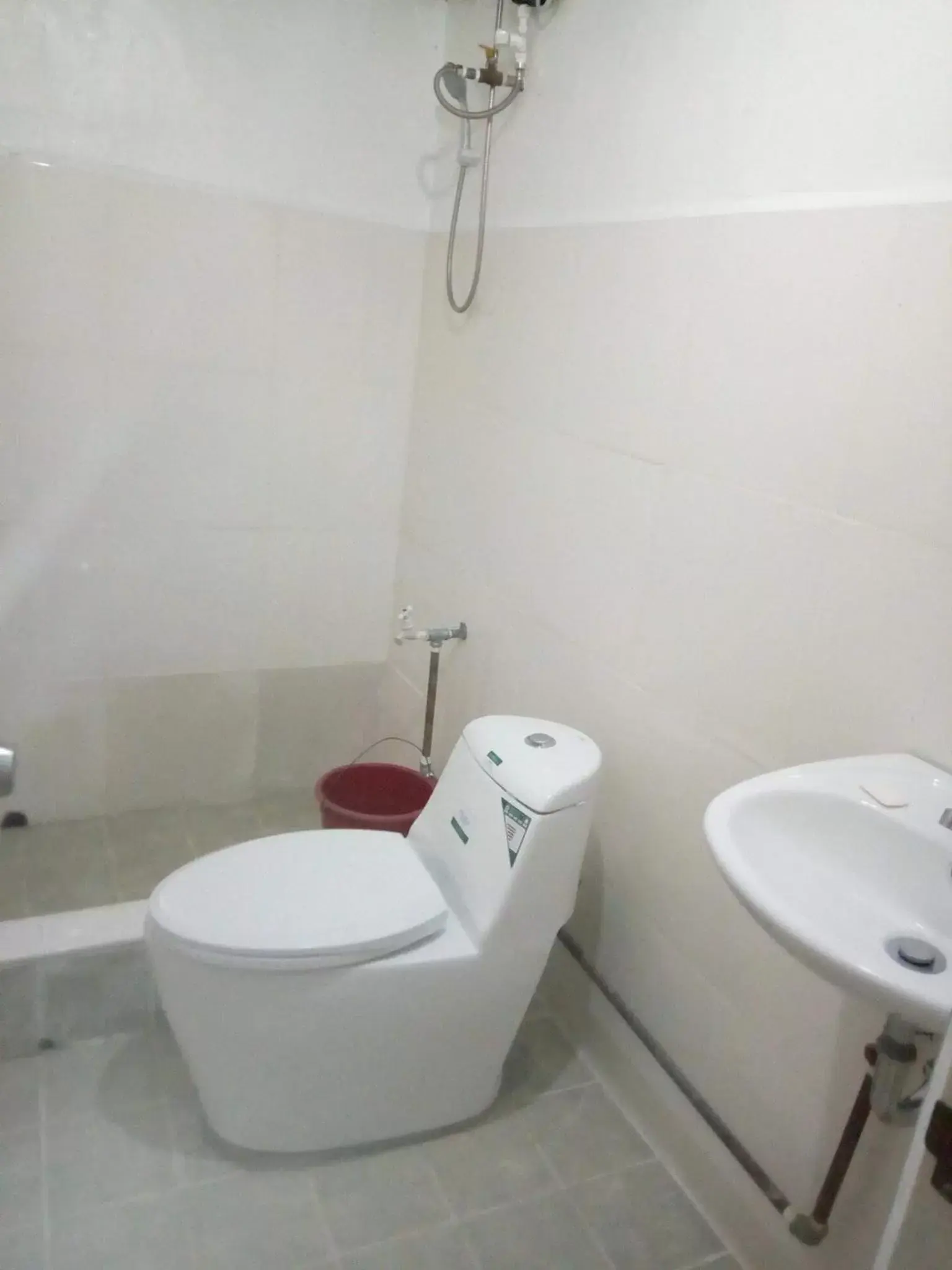 Toilet, Bathroom in Luna Oslob Travellers Inn