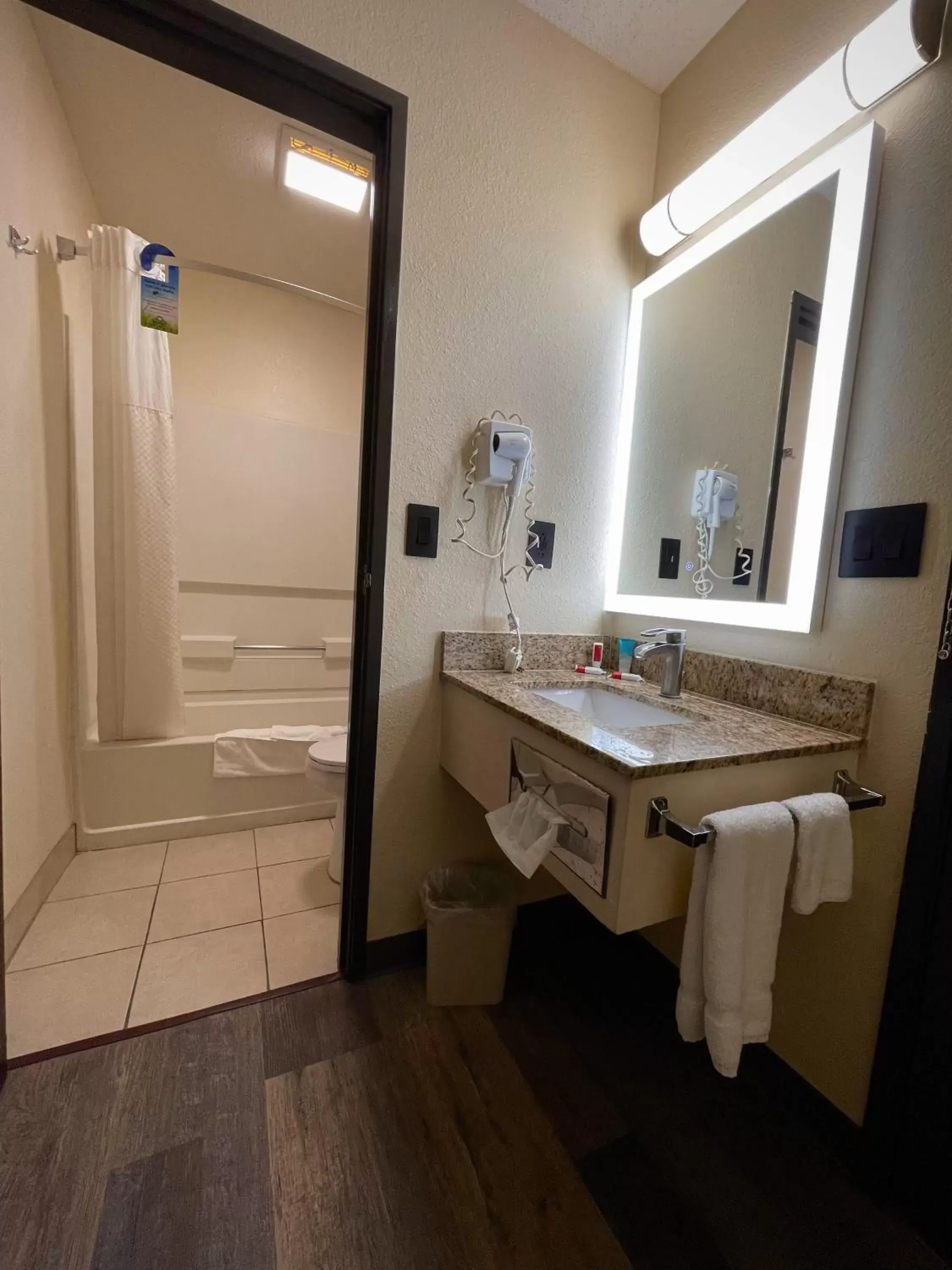 Shower, Bathroom in Days Inn & Suites by Wyndham Kaukauna WI