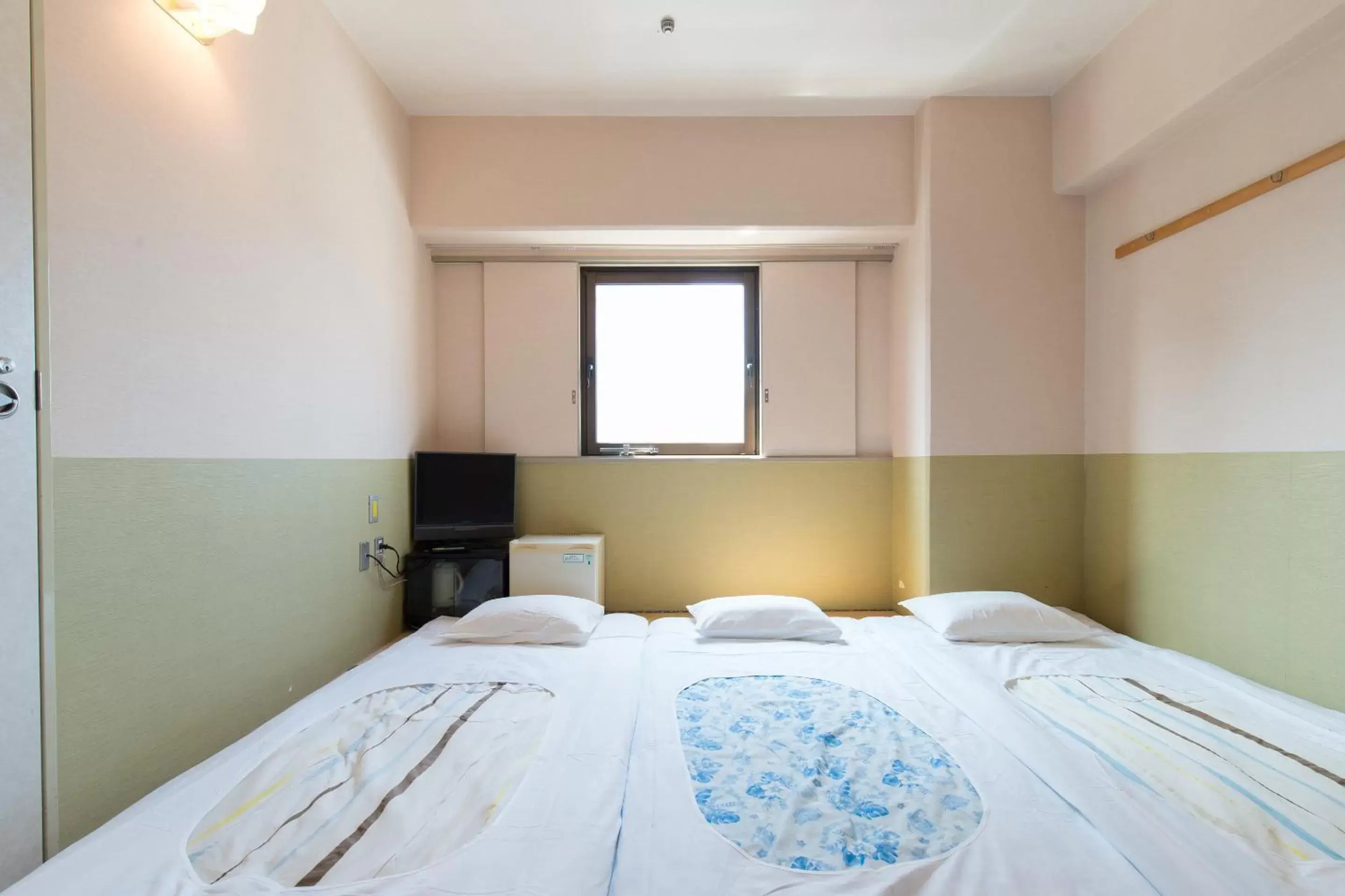 Photo of the whole room, Bed in Tabist Hotel Tetora Kitakyushu