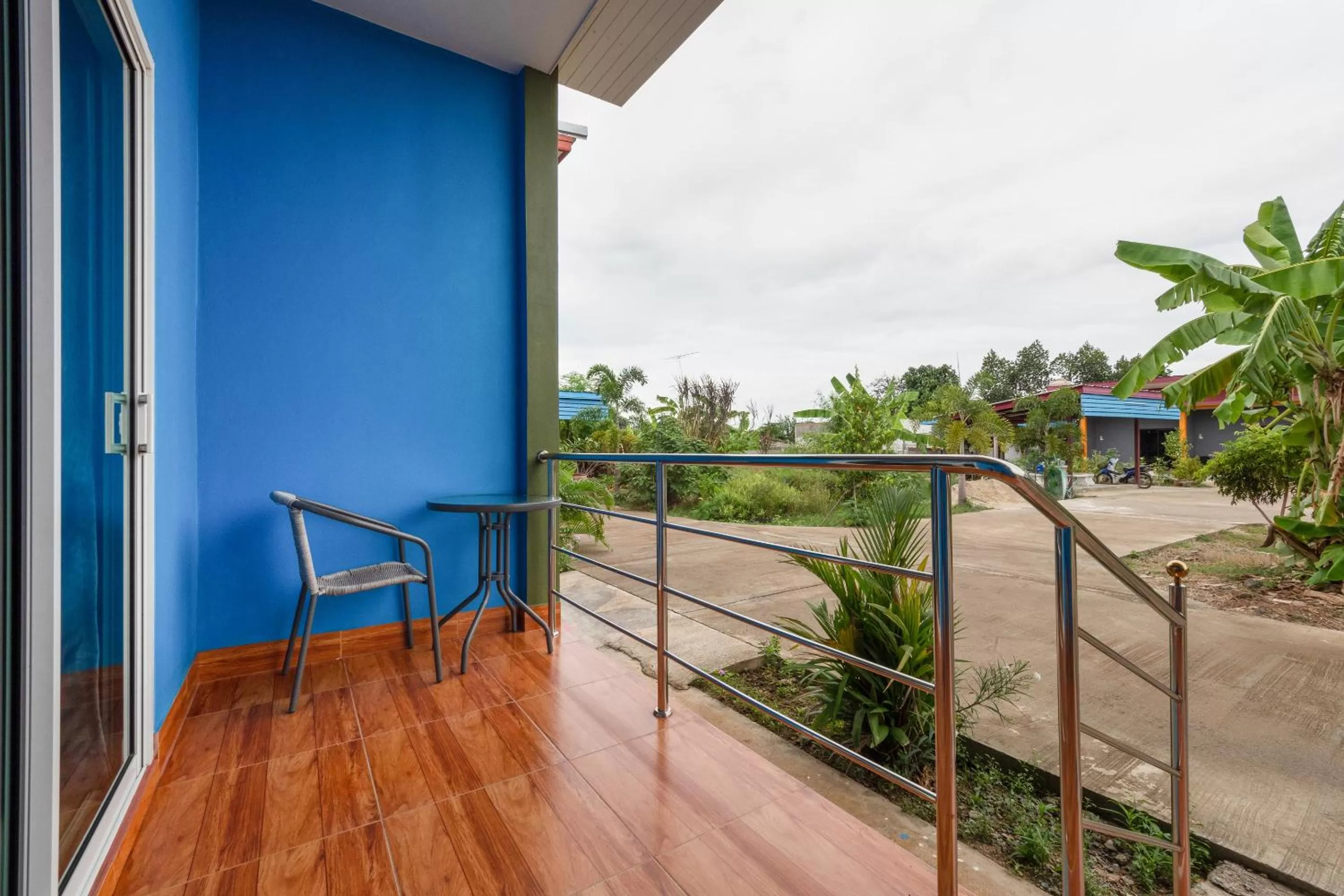 Facade/entrance, Balcony/Terrace in OYO 1044 Vassana Resort