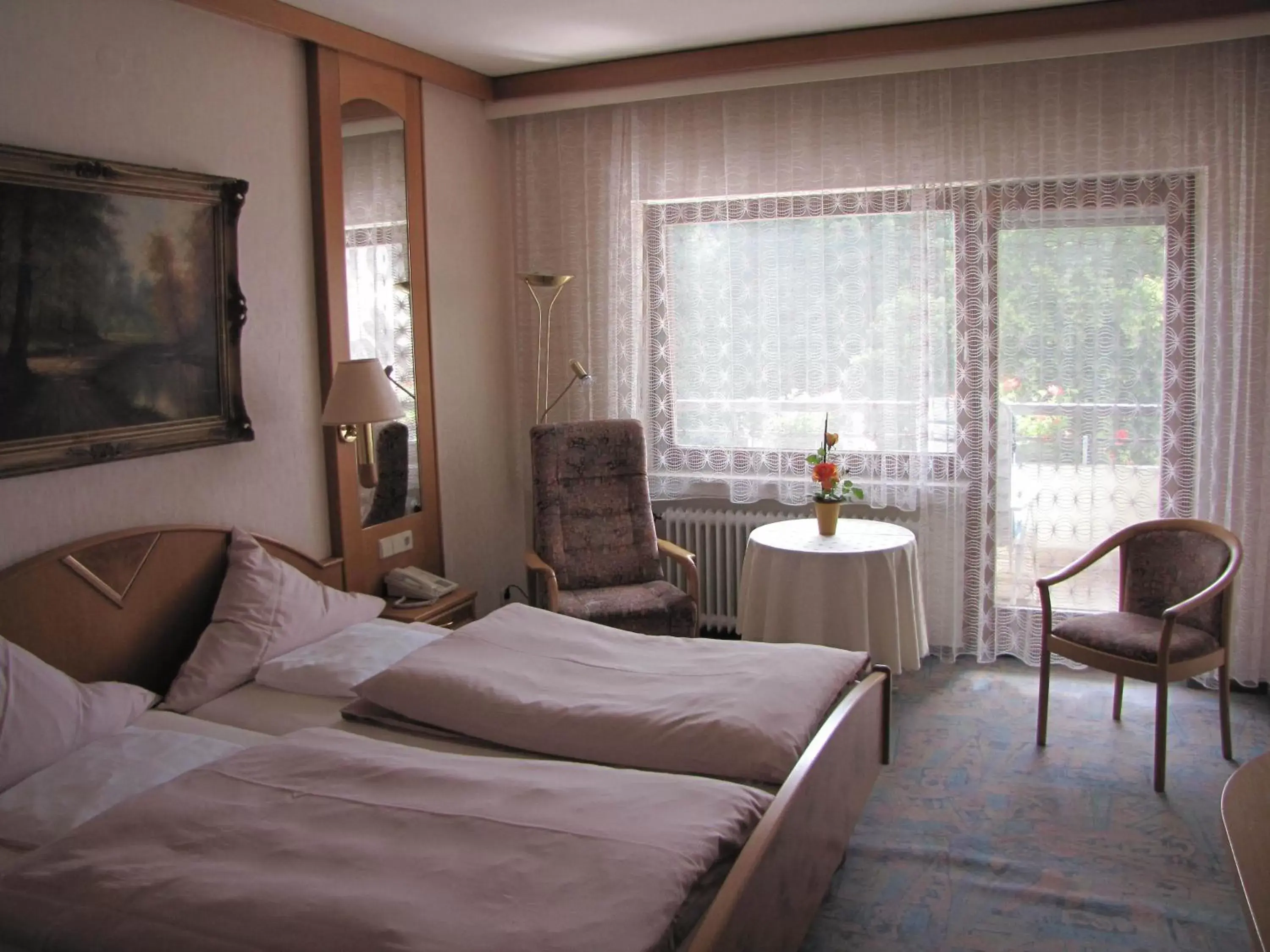 Photo of the whole room, Bed in Hotel Harzer am Kurpark