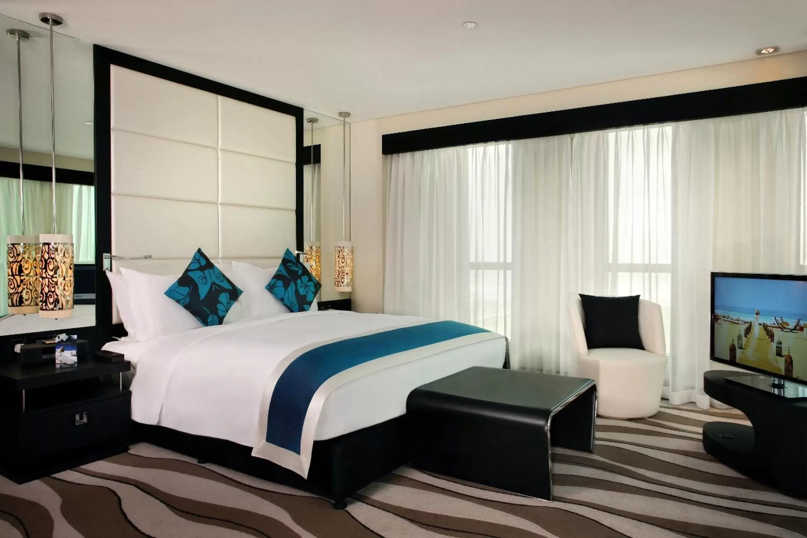 Photo of the whole room, Bed in Sofitel Abu Dhabi Corniche