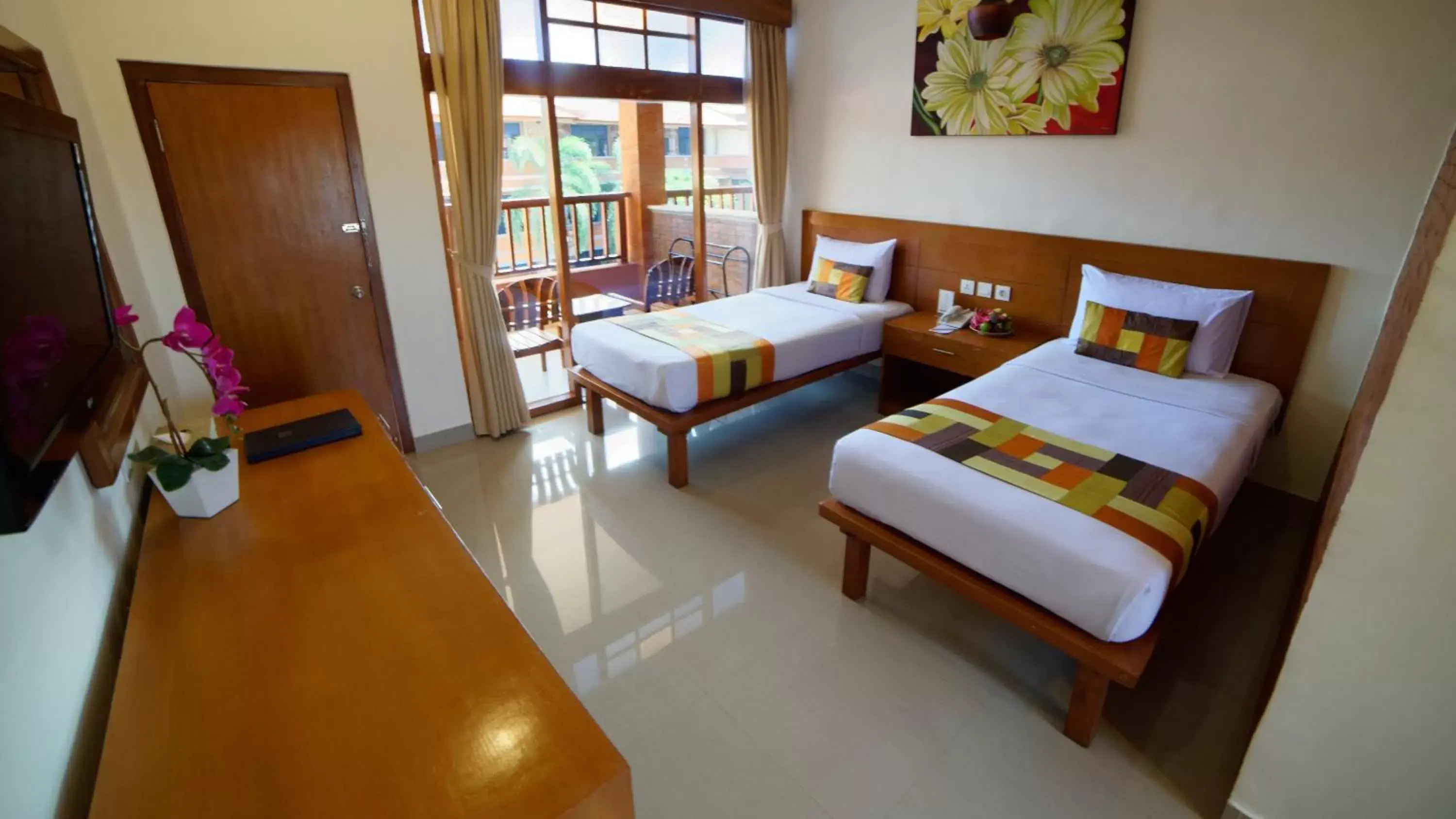 Bed in Wina Holiday Villa Kuta Bali