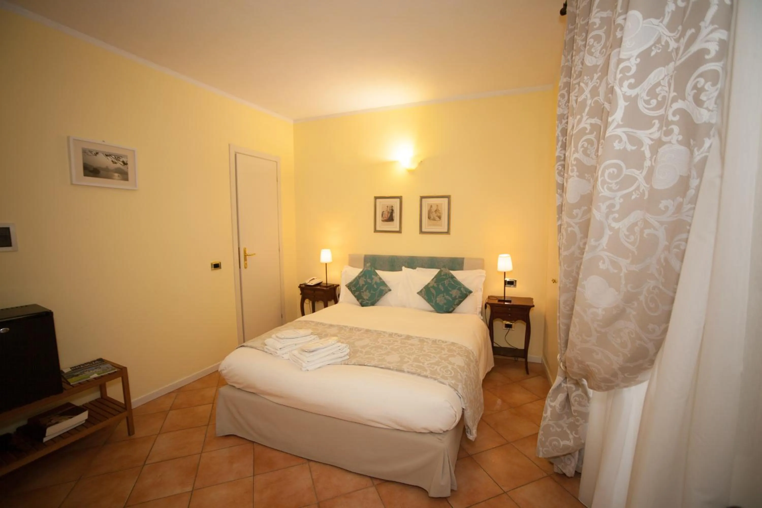Photo of the whole room, Bed in Albergo Orologio