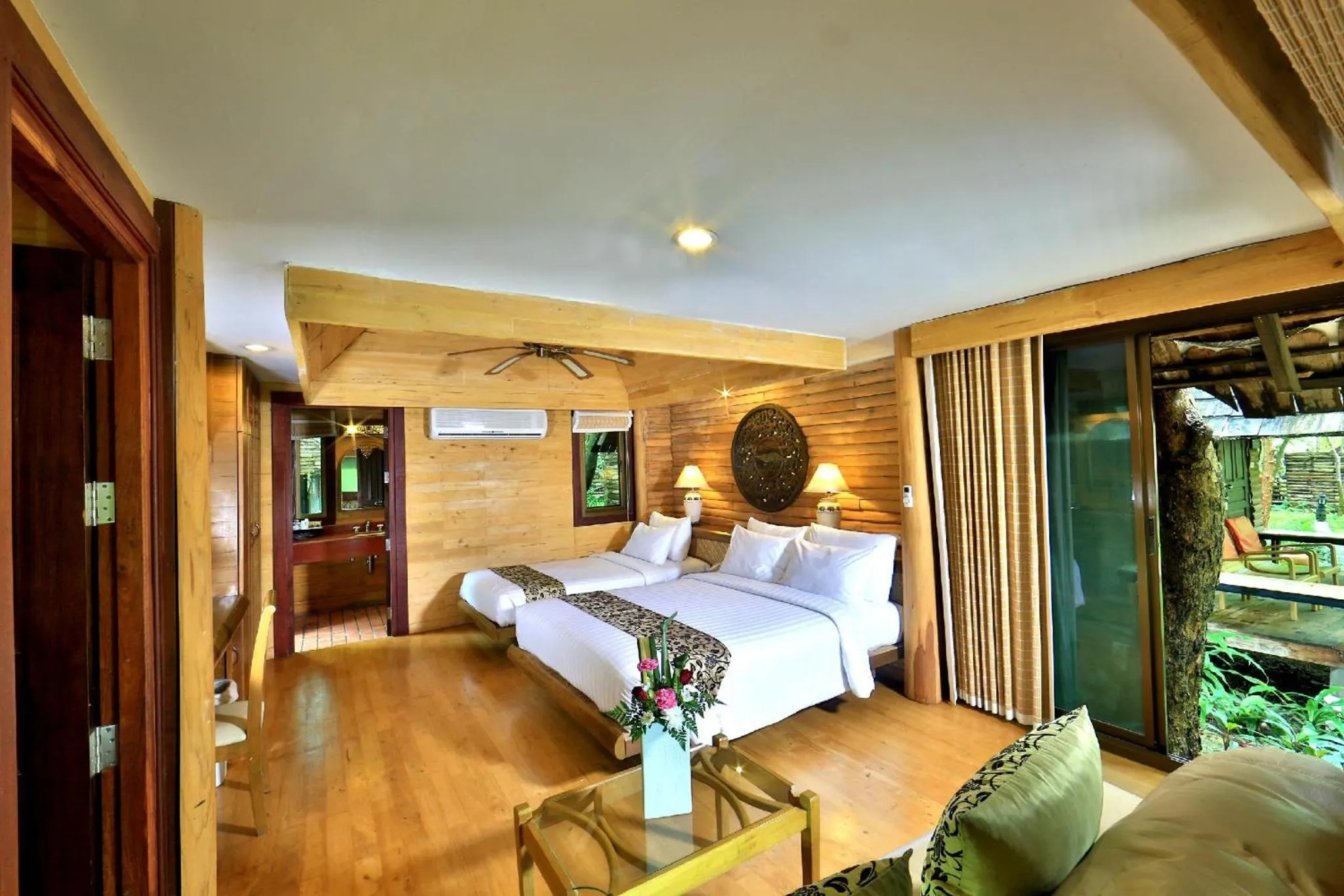 Bed in Sunset Park Resort and Spa By SWR