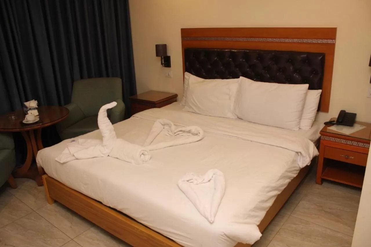 Bed in Jawharet Alswefiah Hotel Suites