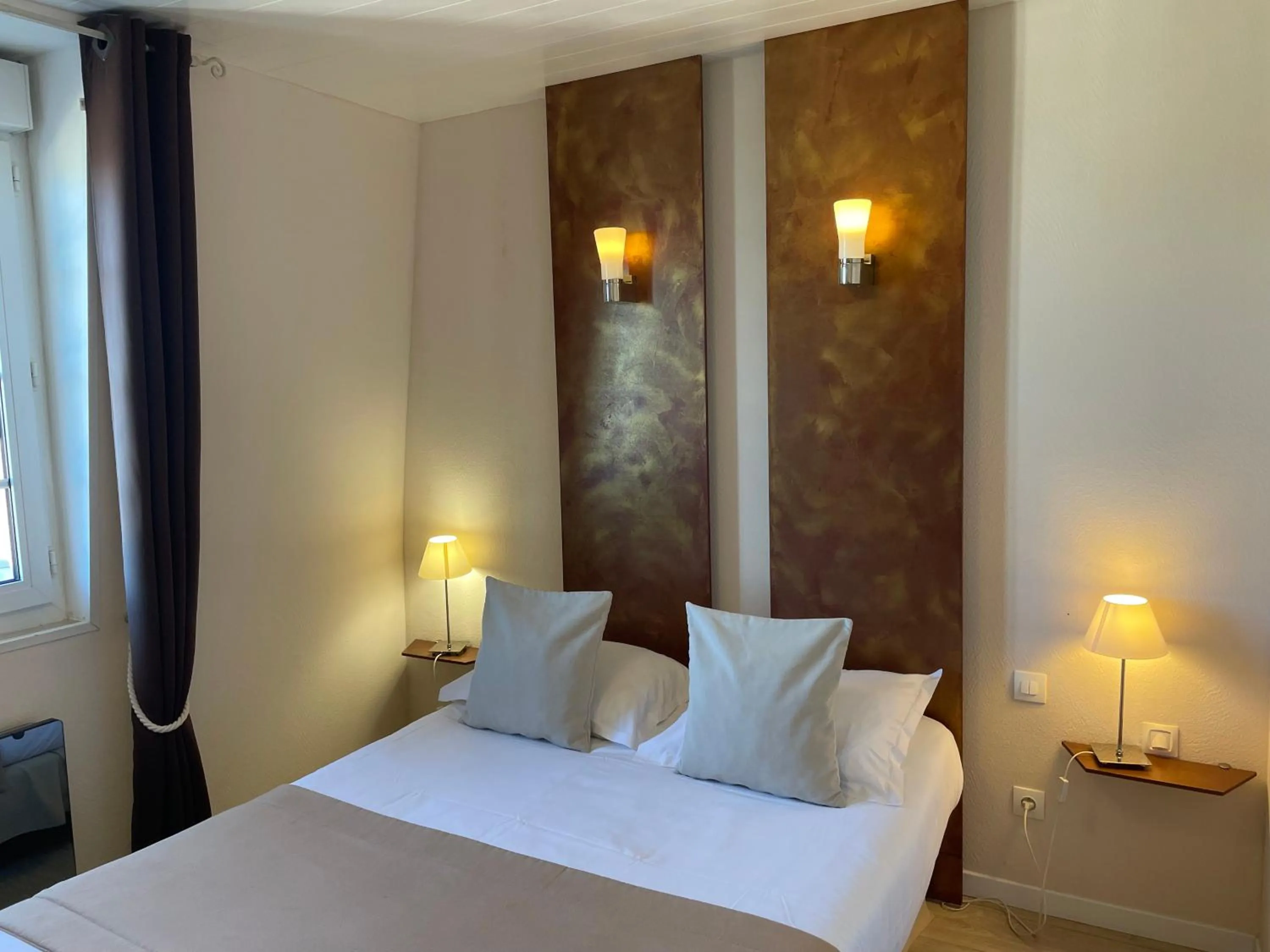 Photo of the whole room, Bed in Hôtel de la Plage