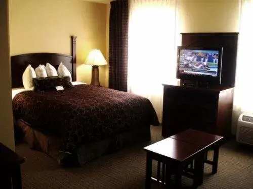 Bed in Staybridge Suites - Kansas City-Independence, an IHG Hotel