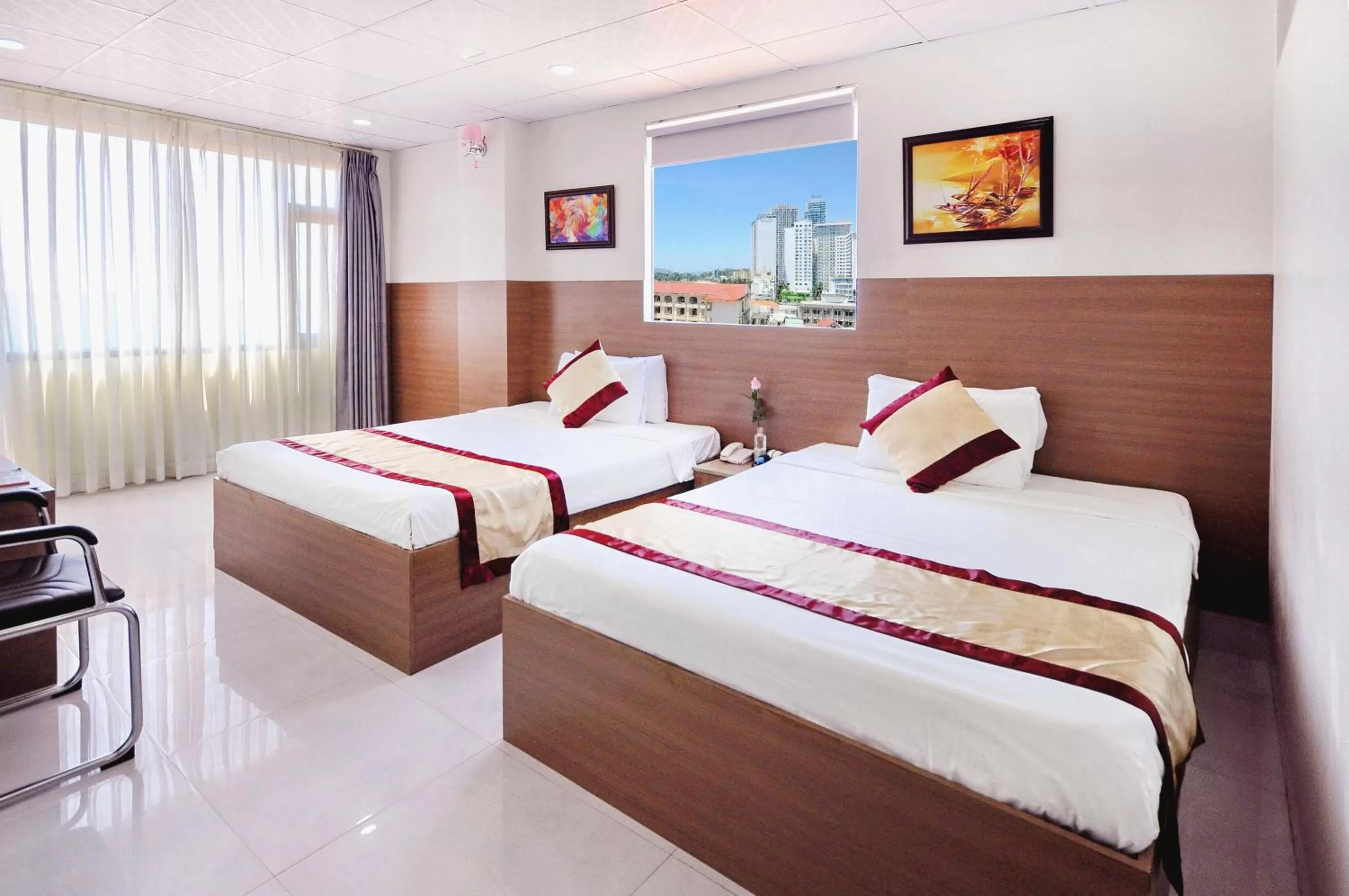 Bed in Arise Seaside Hotel