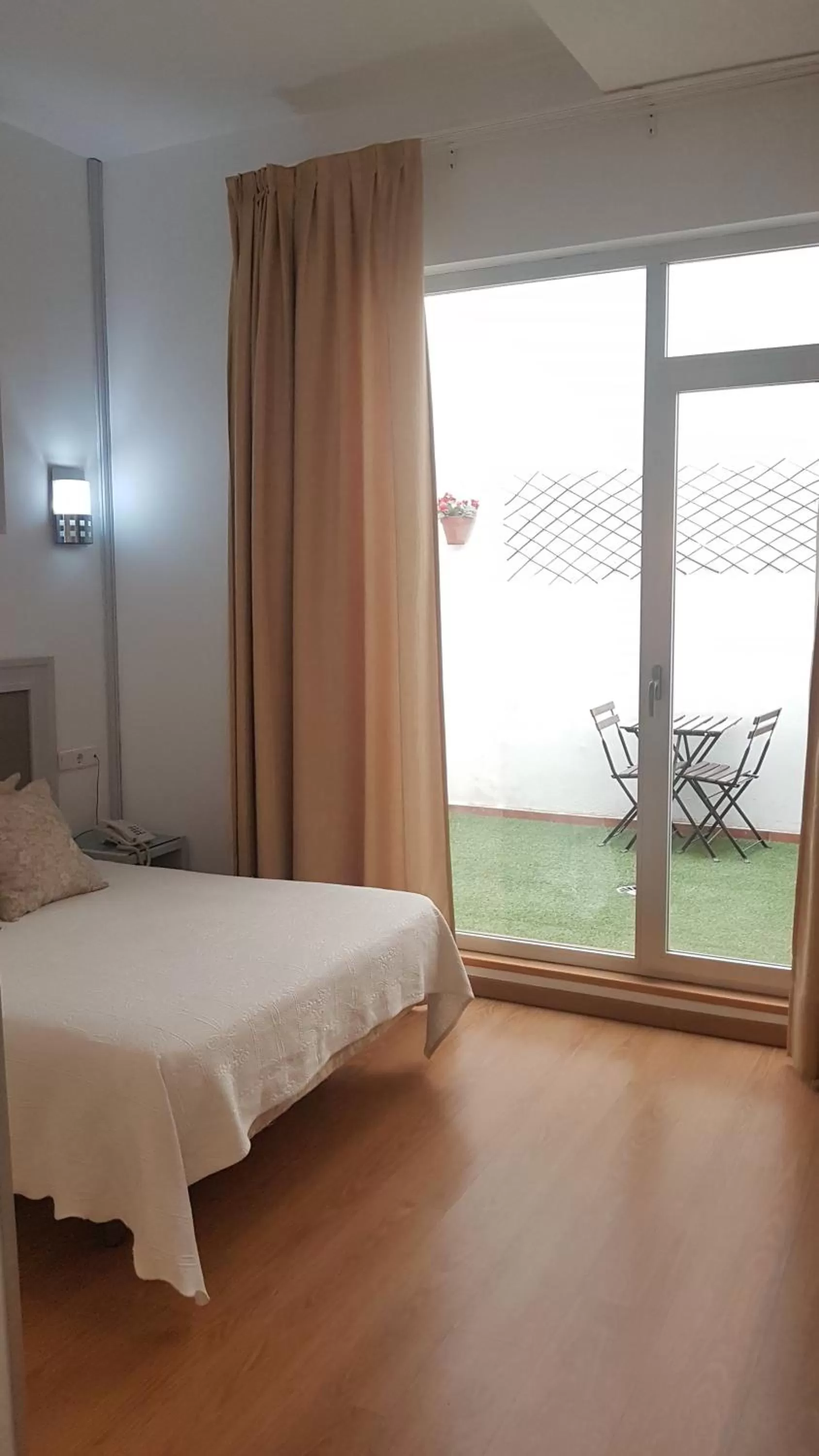 Photo of the whole room, Bed in Hotel y Apartamentos Doña Lola