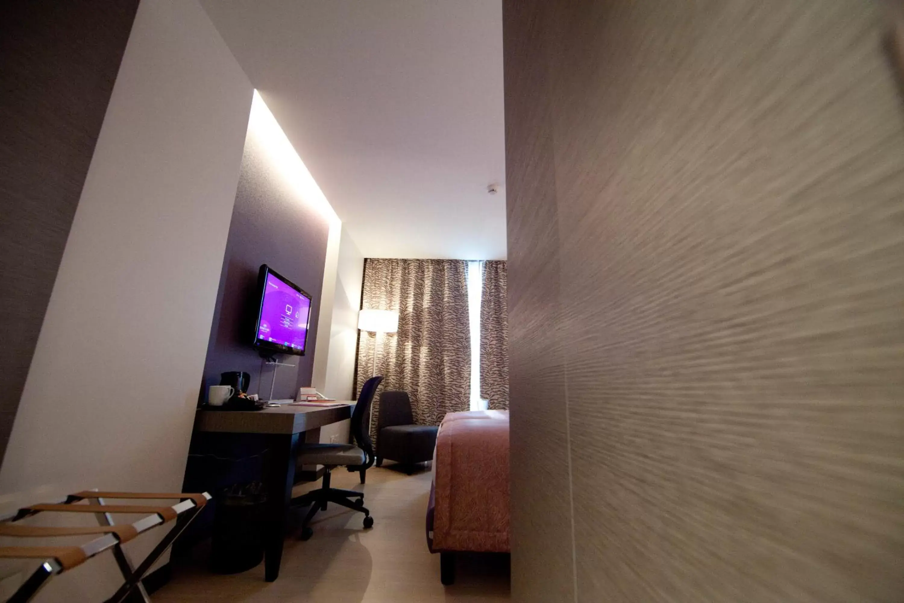 Photo of the whole room, TV/Entertainment Center in Crowne Plaza Verona Fiera, an IHG Hotel