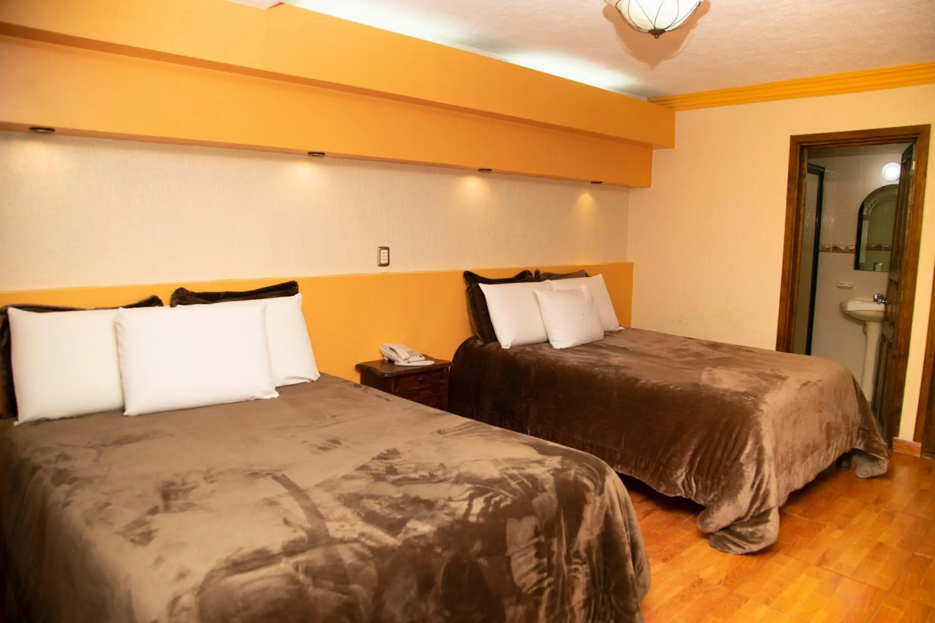 Bed in Gran Hotel El Encanto Bed in Gran Hotel El Encanto