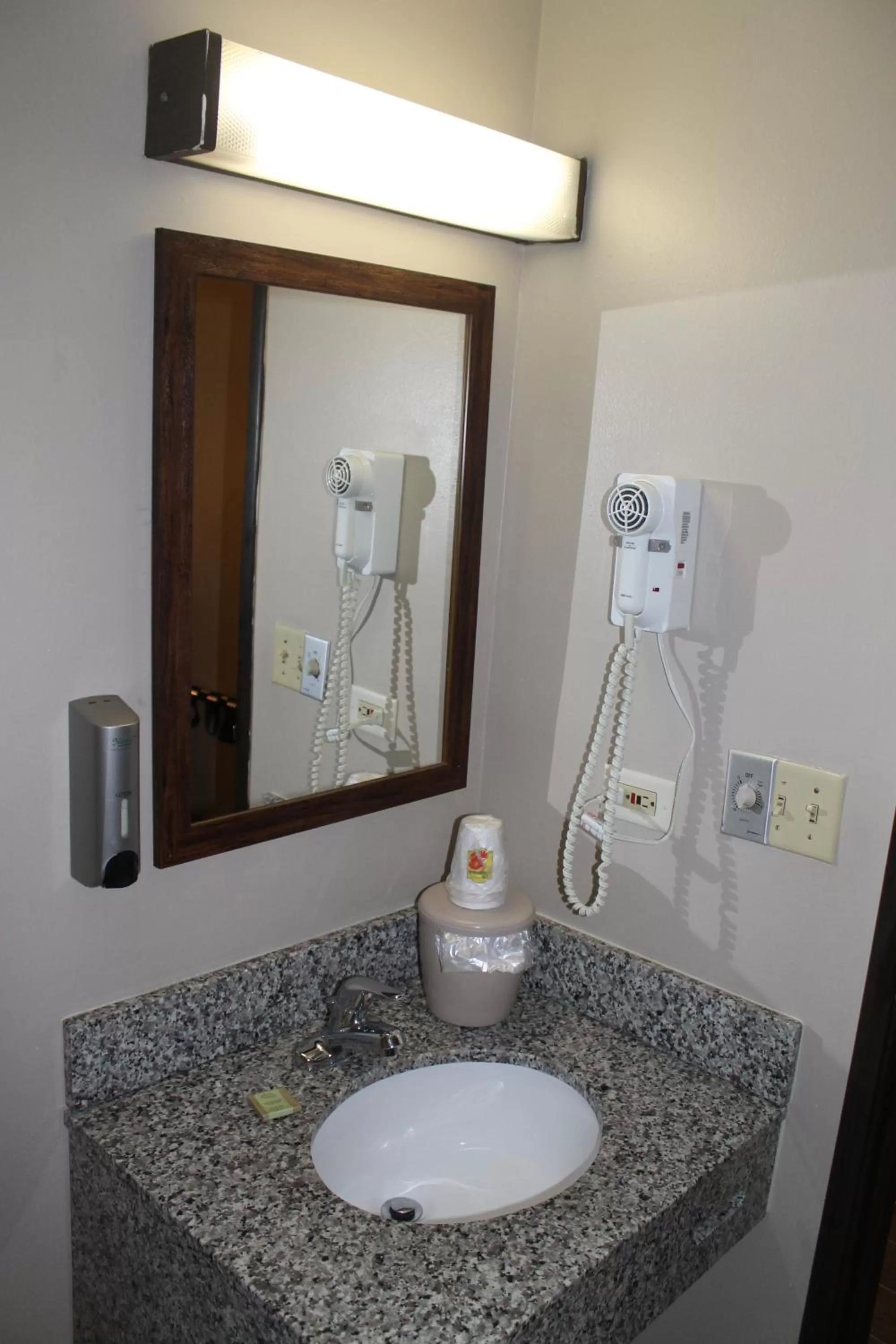 Bathroom in Super 8 by Wyndham Bridgeview/Chicago Area