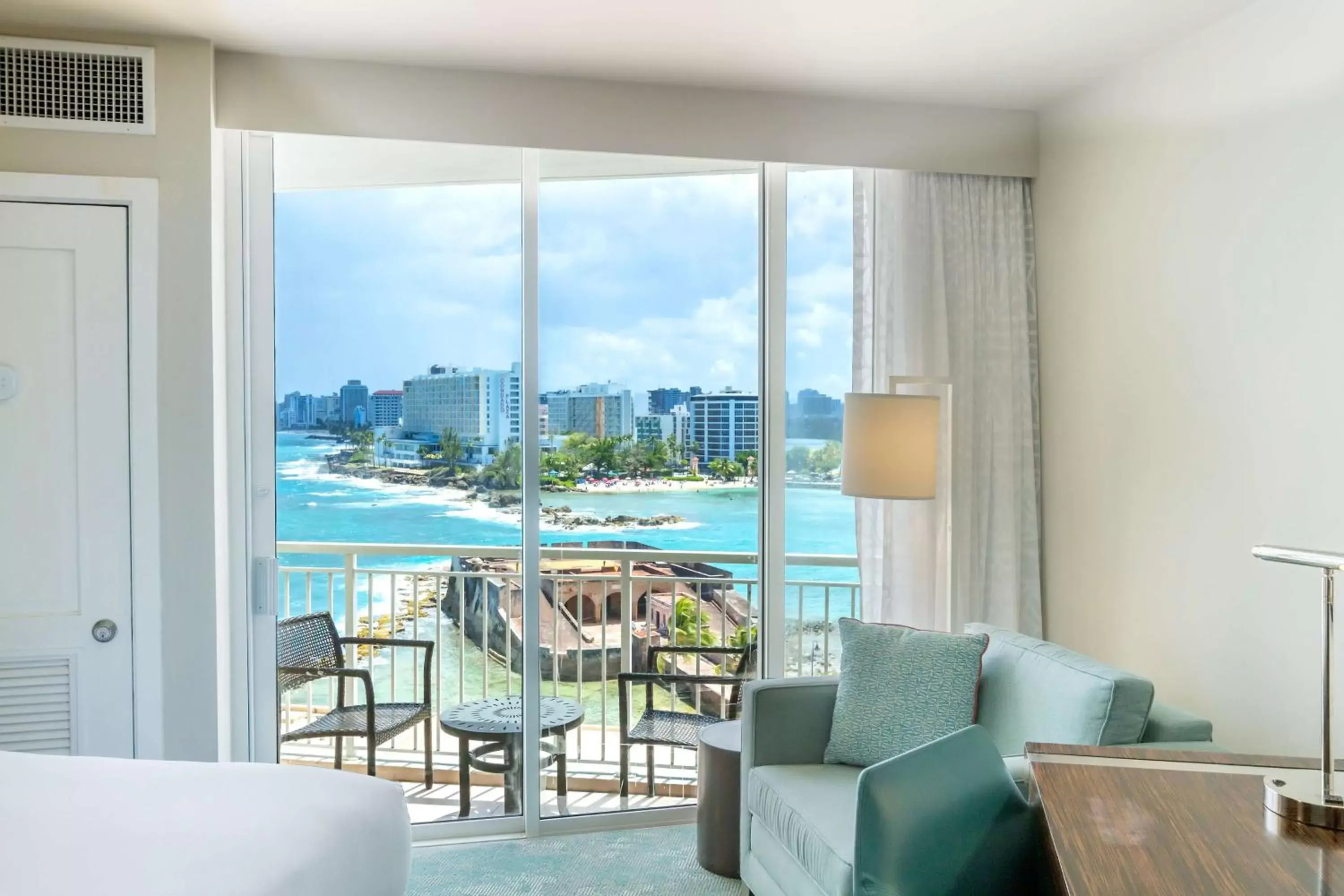 Bedroom, Pool View in Caribe Hilton