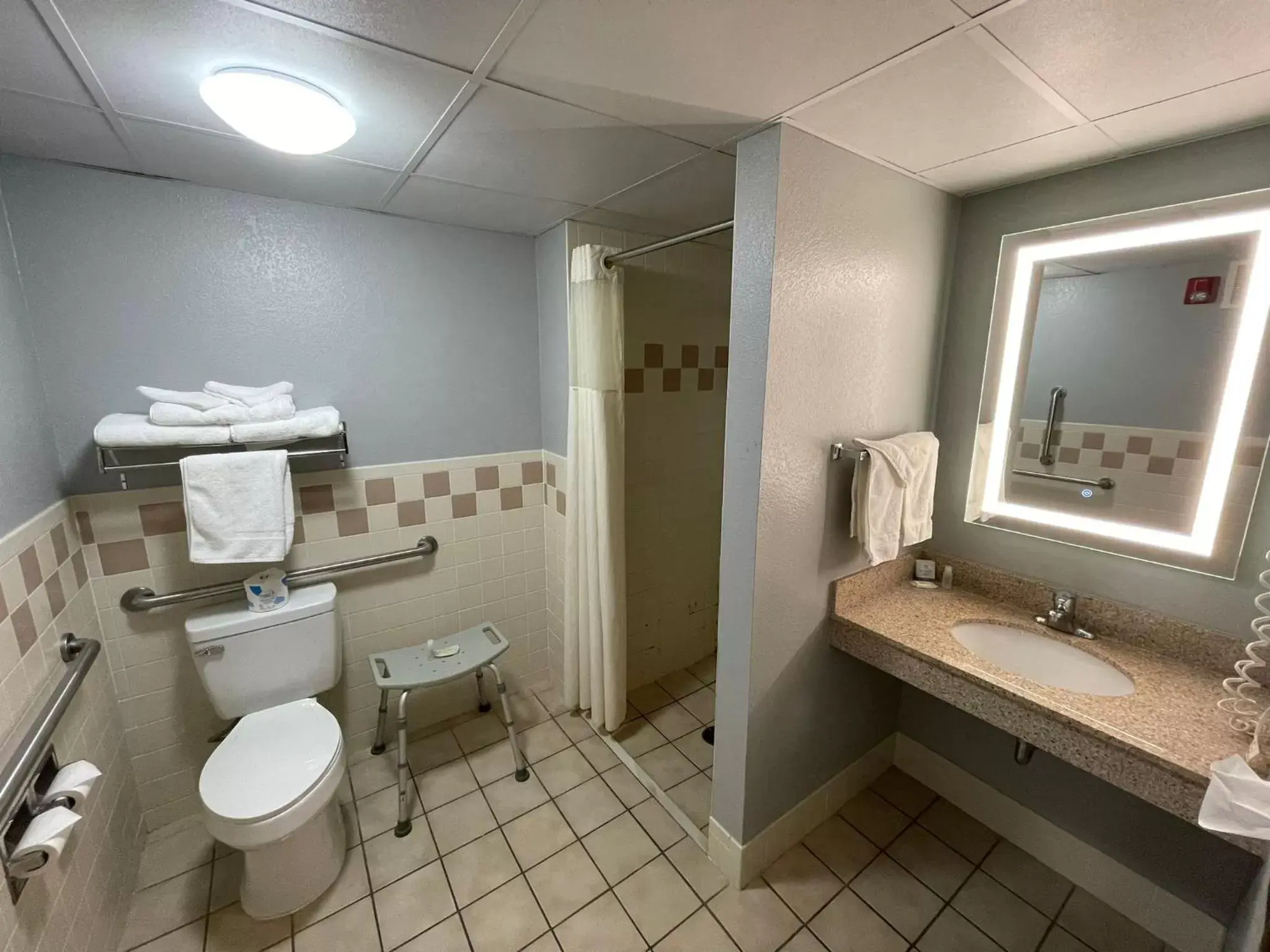 Bathroom in AmericInn by Wyndham Sayre