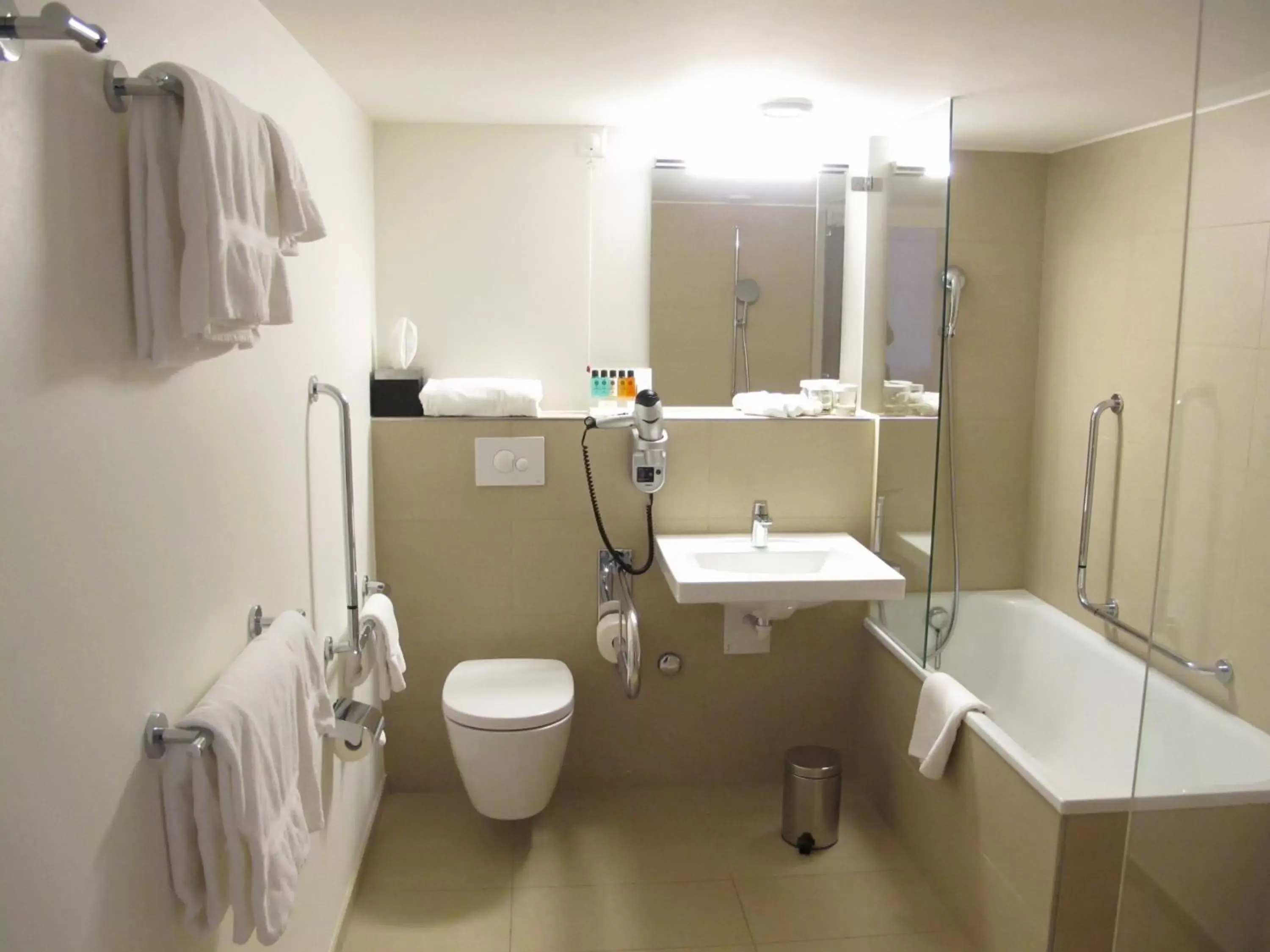 Photo of the whole room, Bathroom in Crowne Plaza Zürich, an IHG Hotel