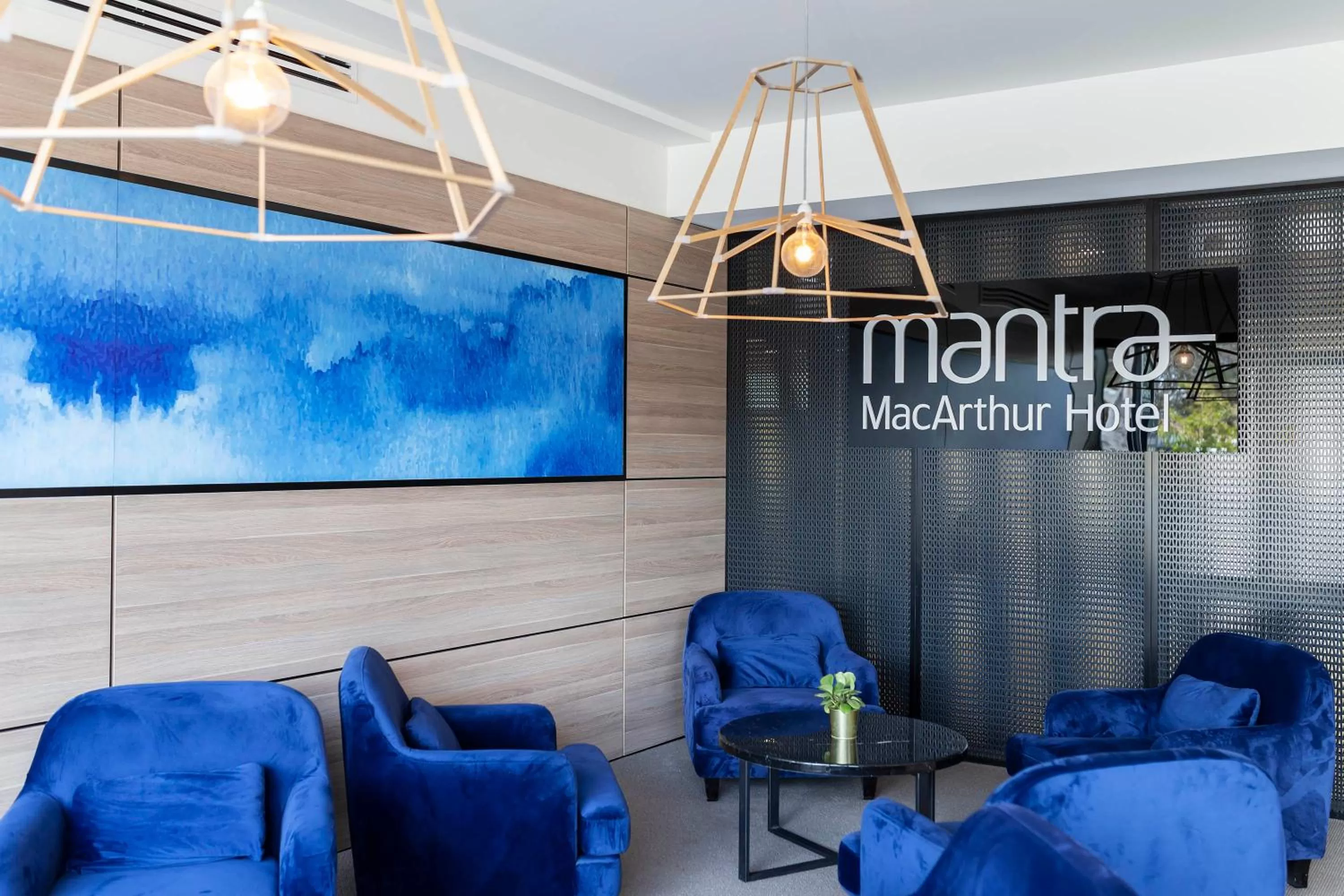 Lobby or reception in Mantra MacArthur Hotel