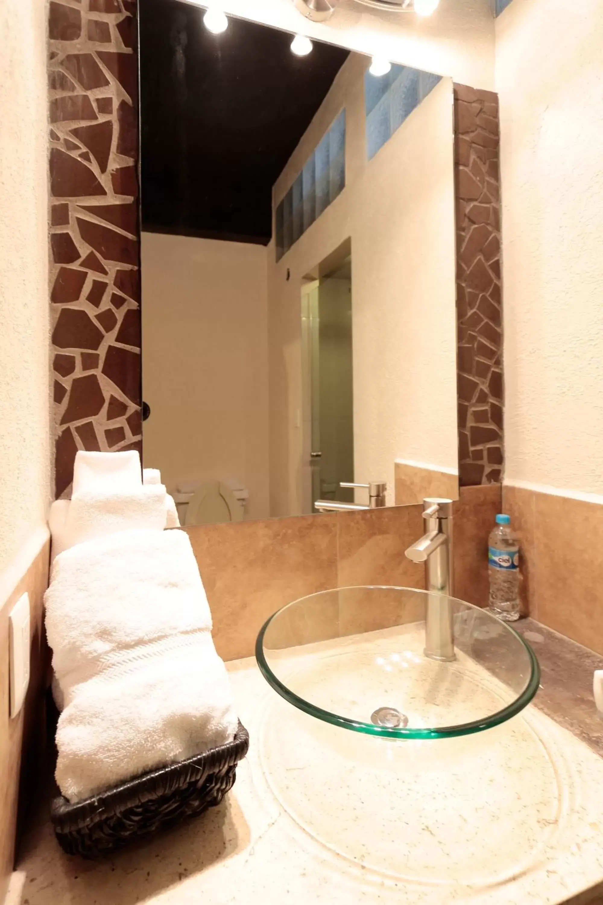 Bathroom in Aztic Hotel and Executive Suites