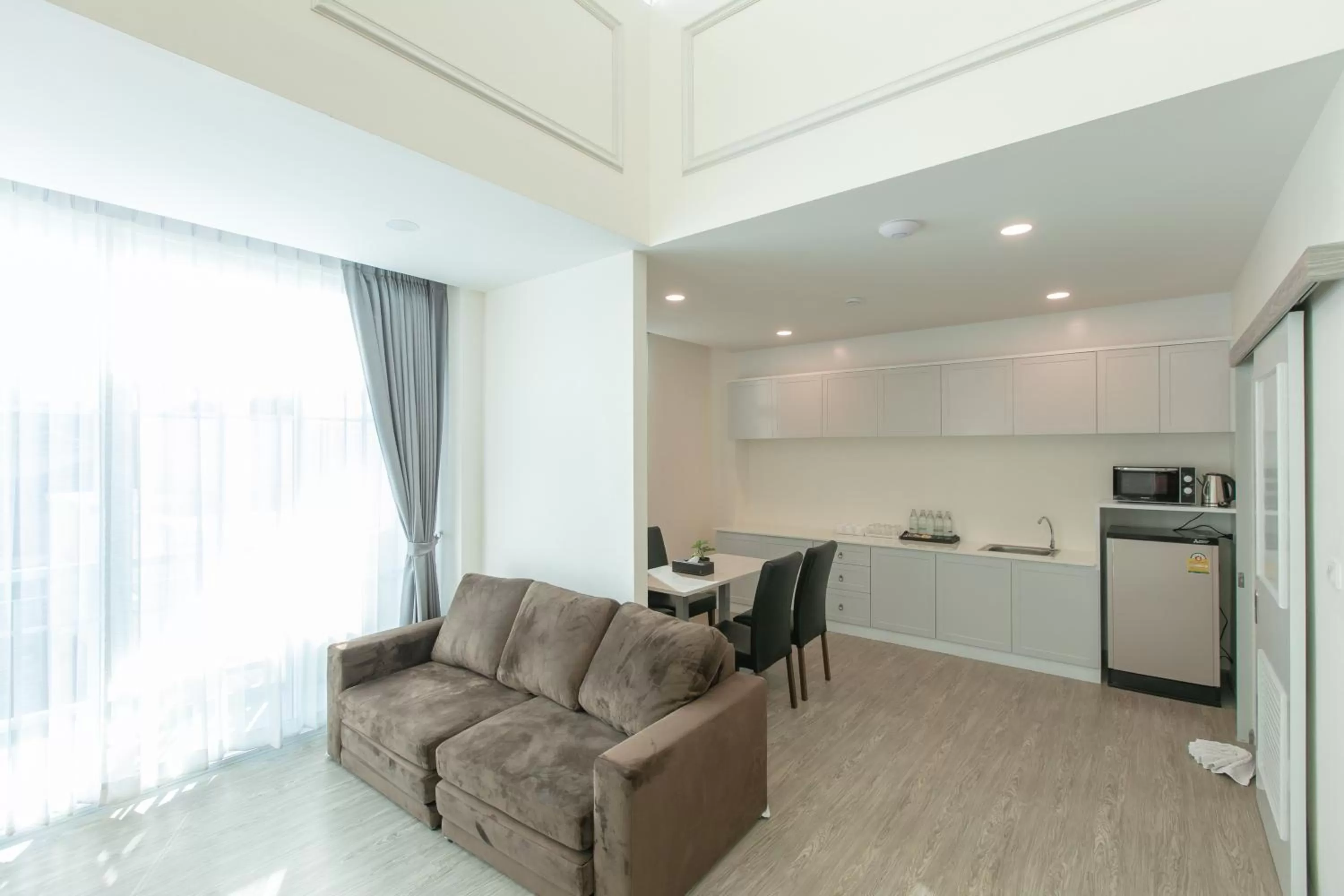 Kitchen or kitchenette in De Hug Hotel & Residence