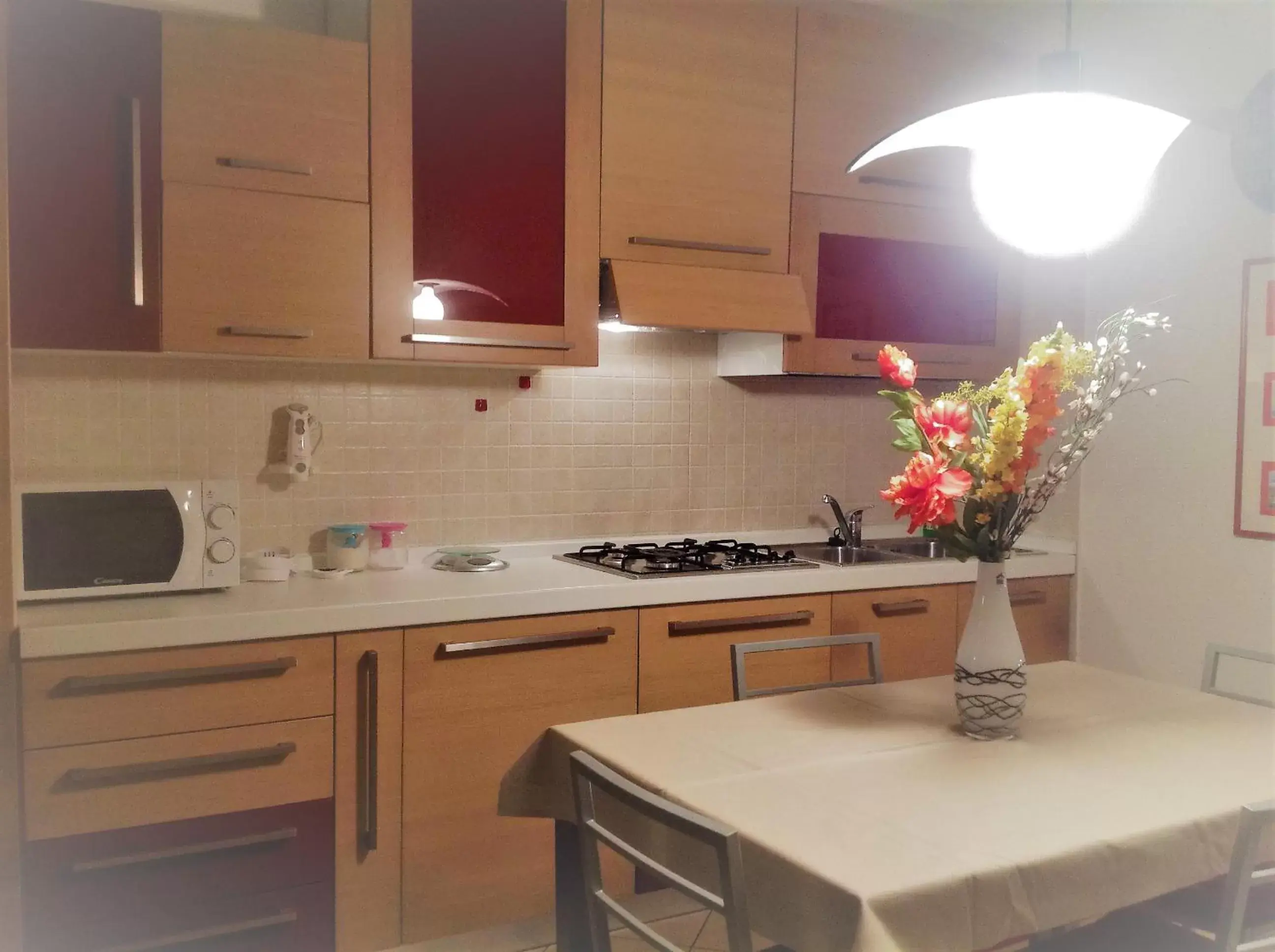 Kitchen/Kitchenette in Villaggio dei Fiori Apart- Hotel 3 Stars - Family Resort