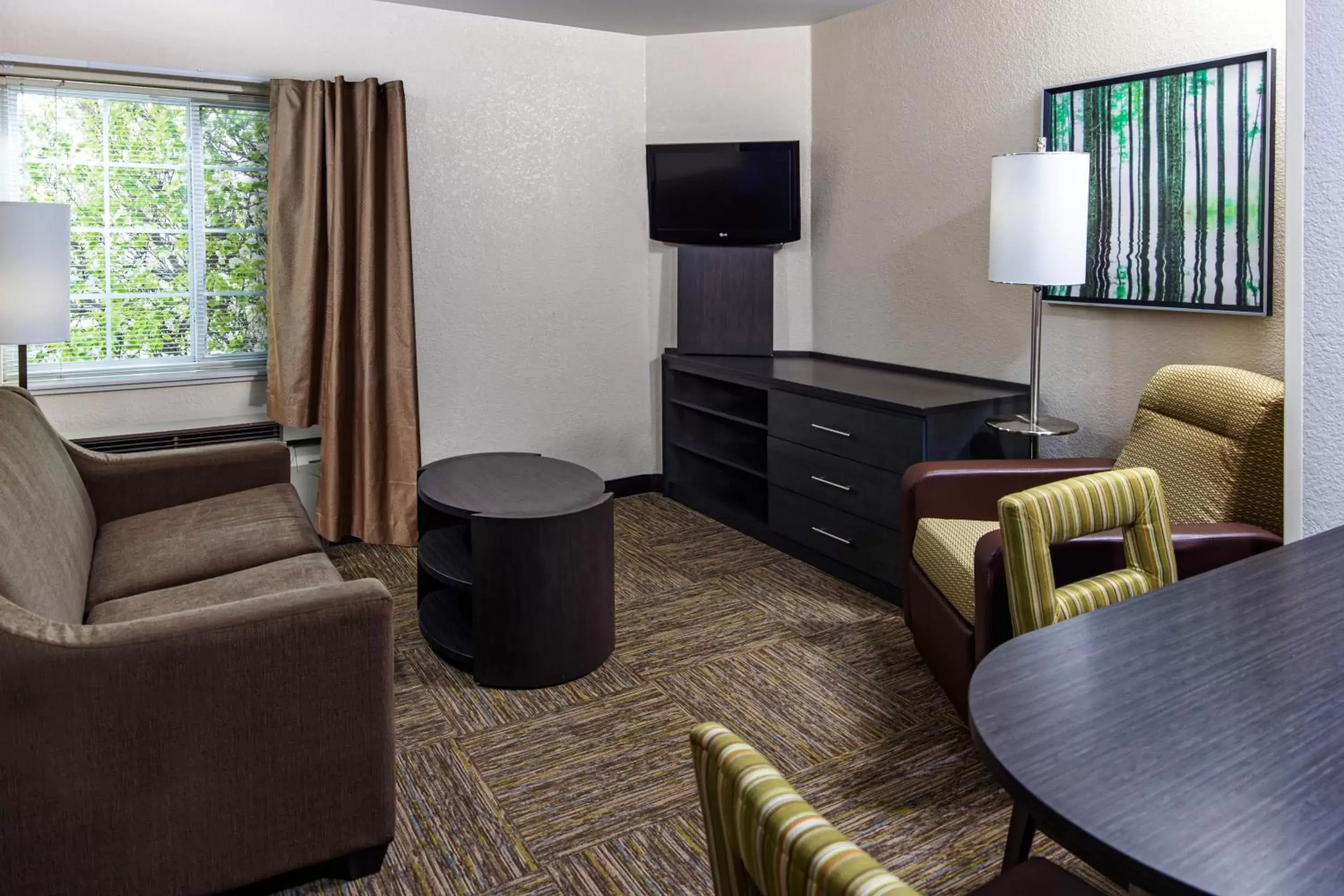 Living room, Seating Area in Candlewood Suites Appleton, an IHG Hotel