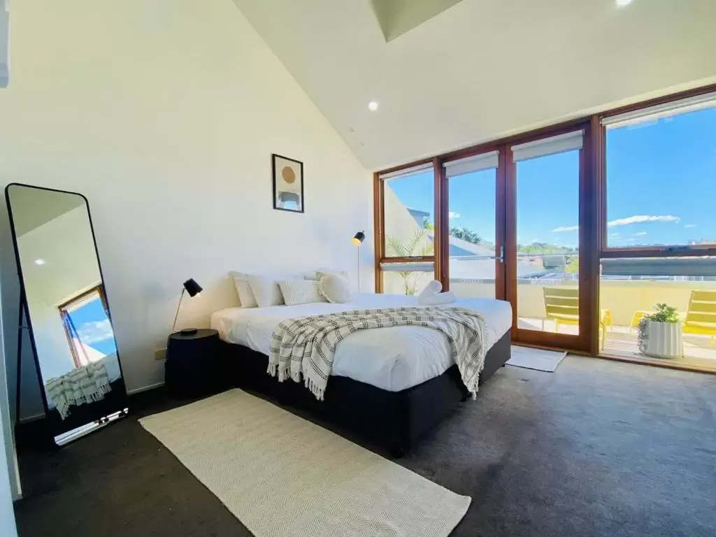 Bedroom in Byron Butter Factory Apartments